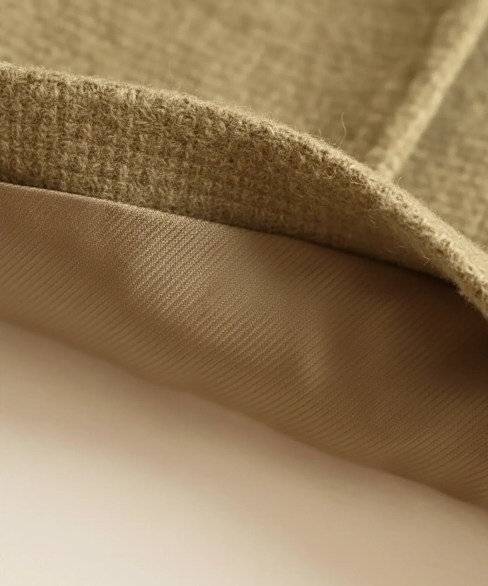 Close up of the lining inside the Tan tweed blazer