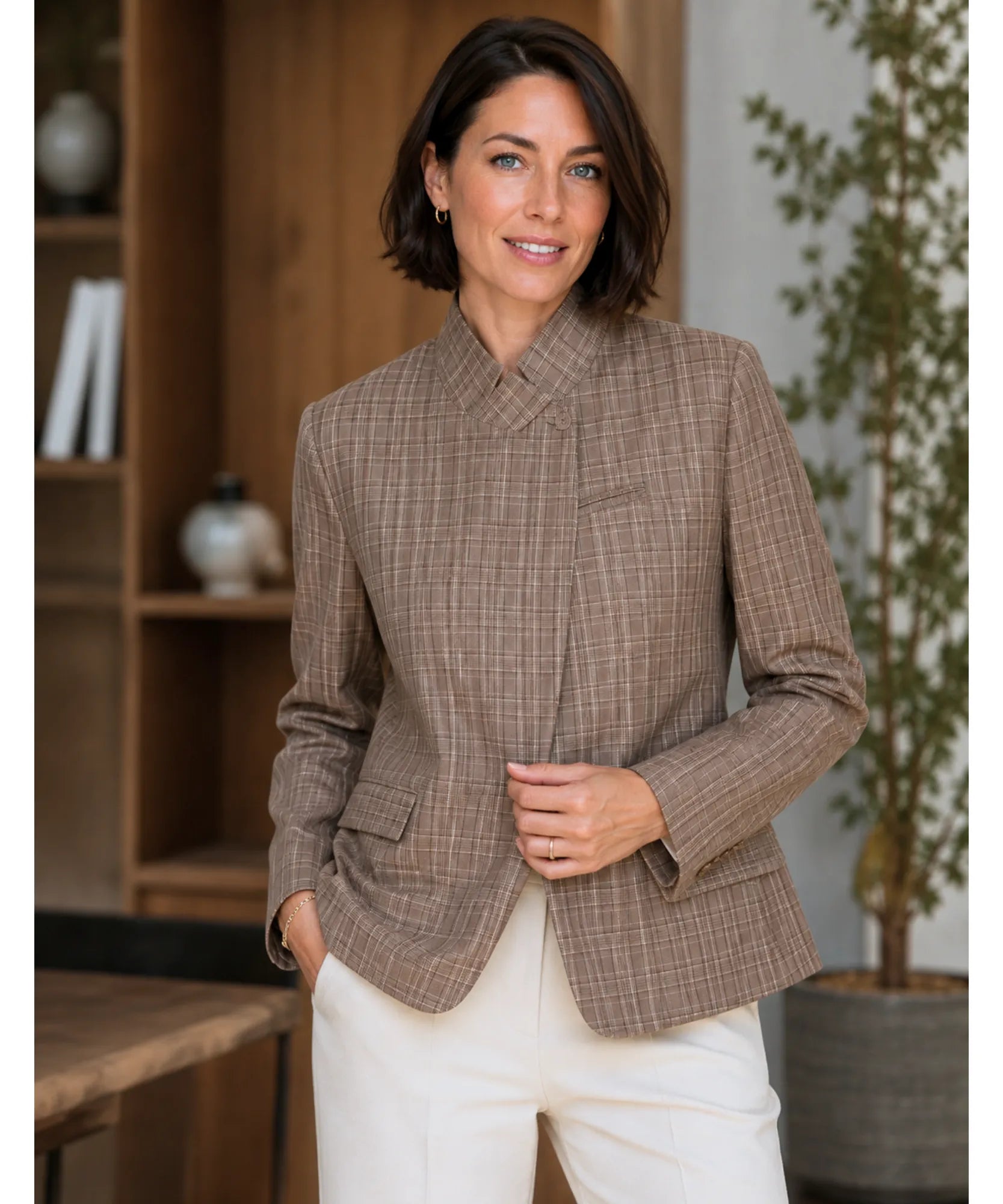 Women's brown plaid blazer with high collar and rounded hem