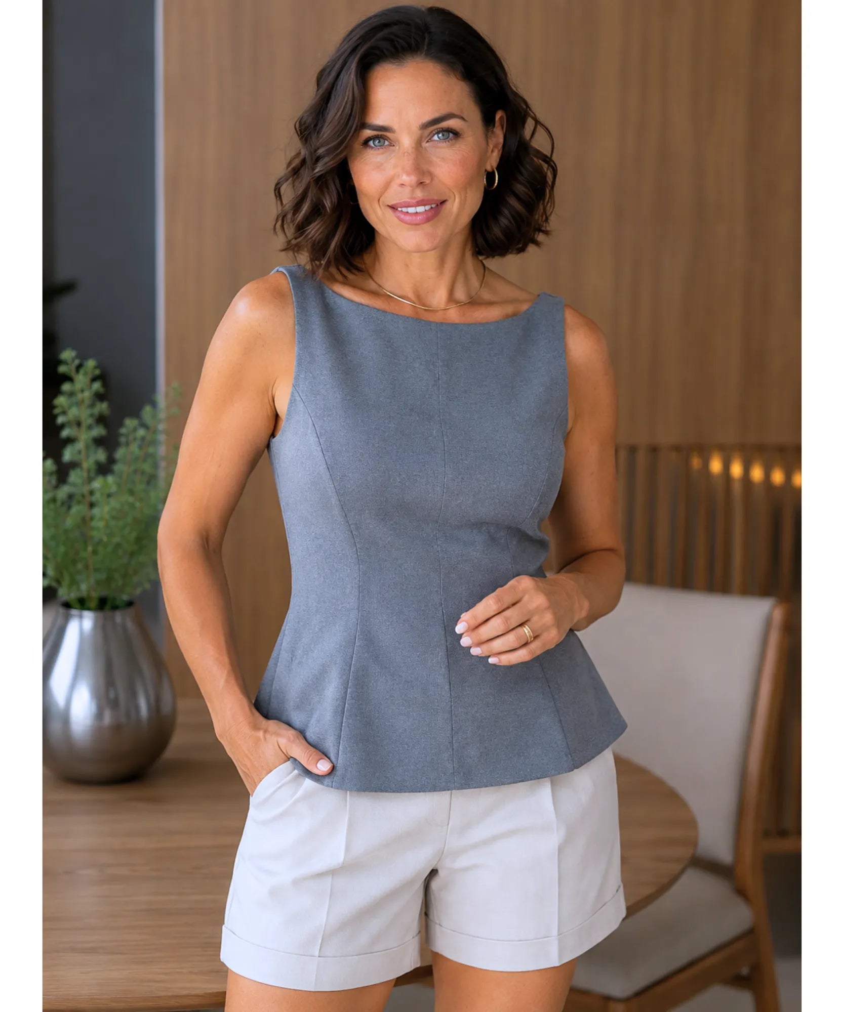 Heather gray peplum top styled with ivory tailored shorts