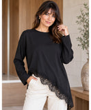 Women's asymmetrical top with lace trim in black