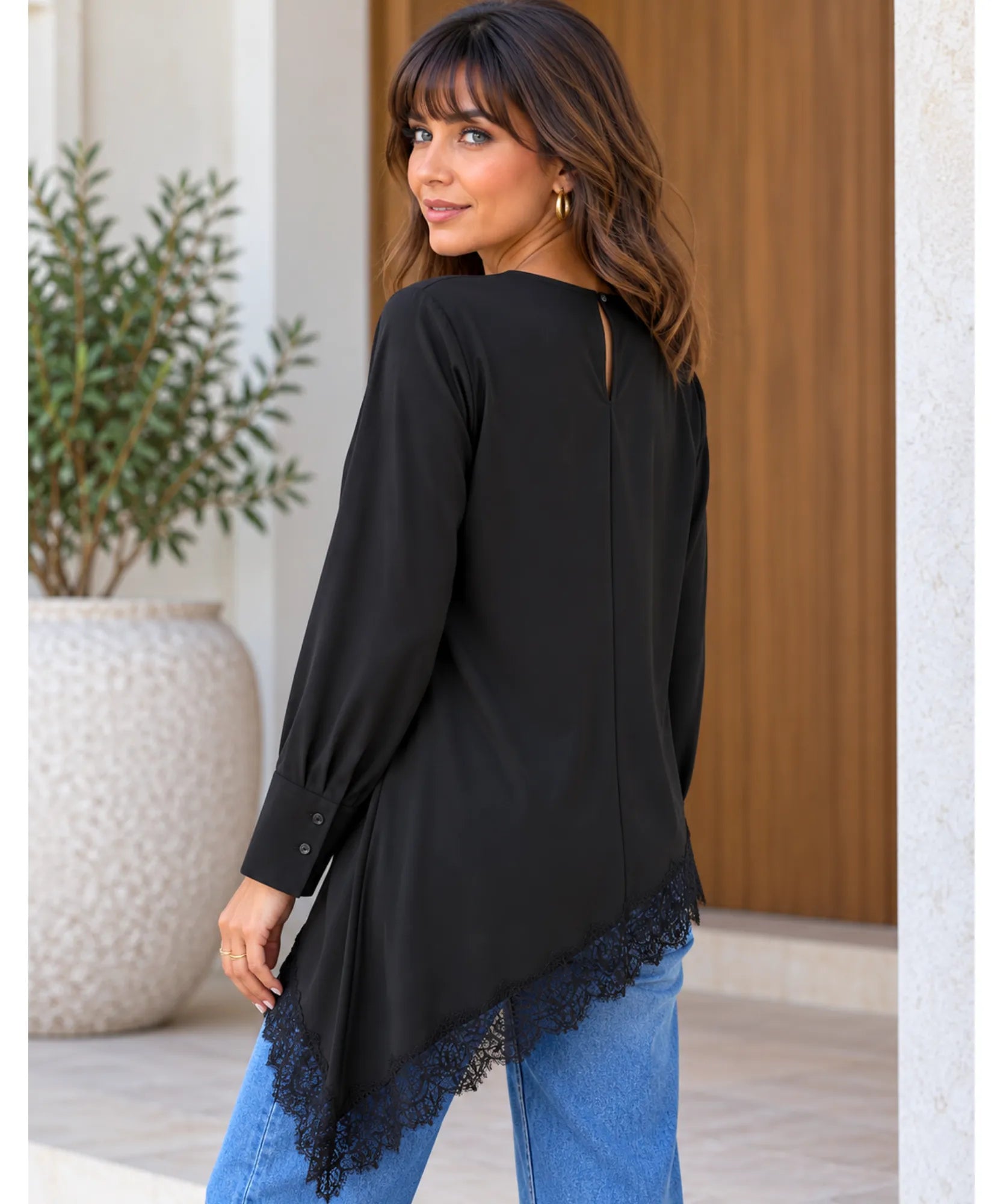Women's asymmetrical top with lace trim in black