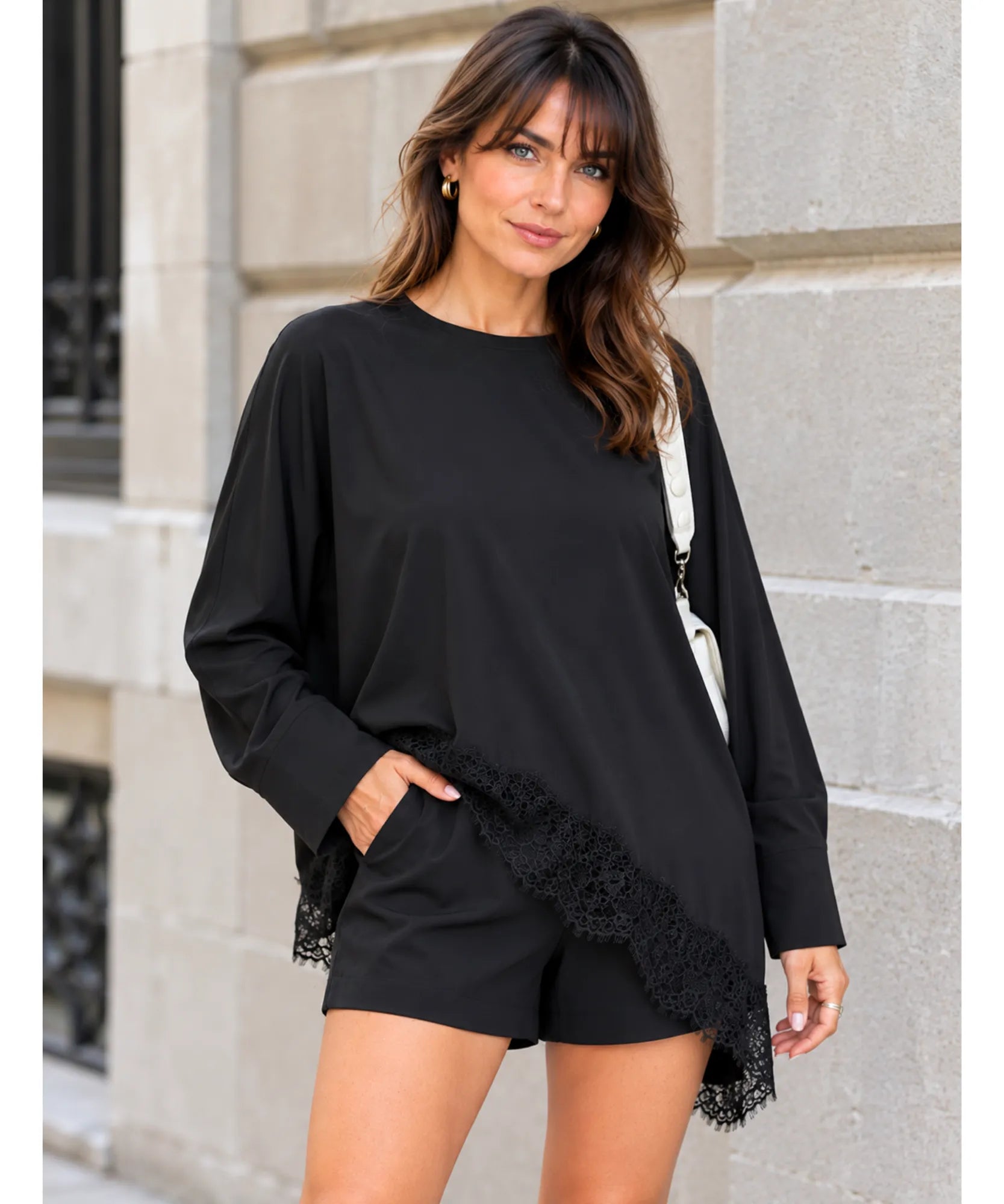 Women's asymmetrical top with lace trim in black, full look