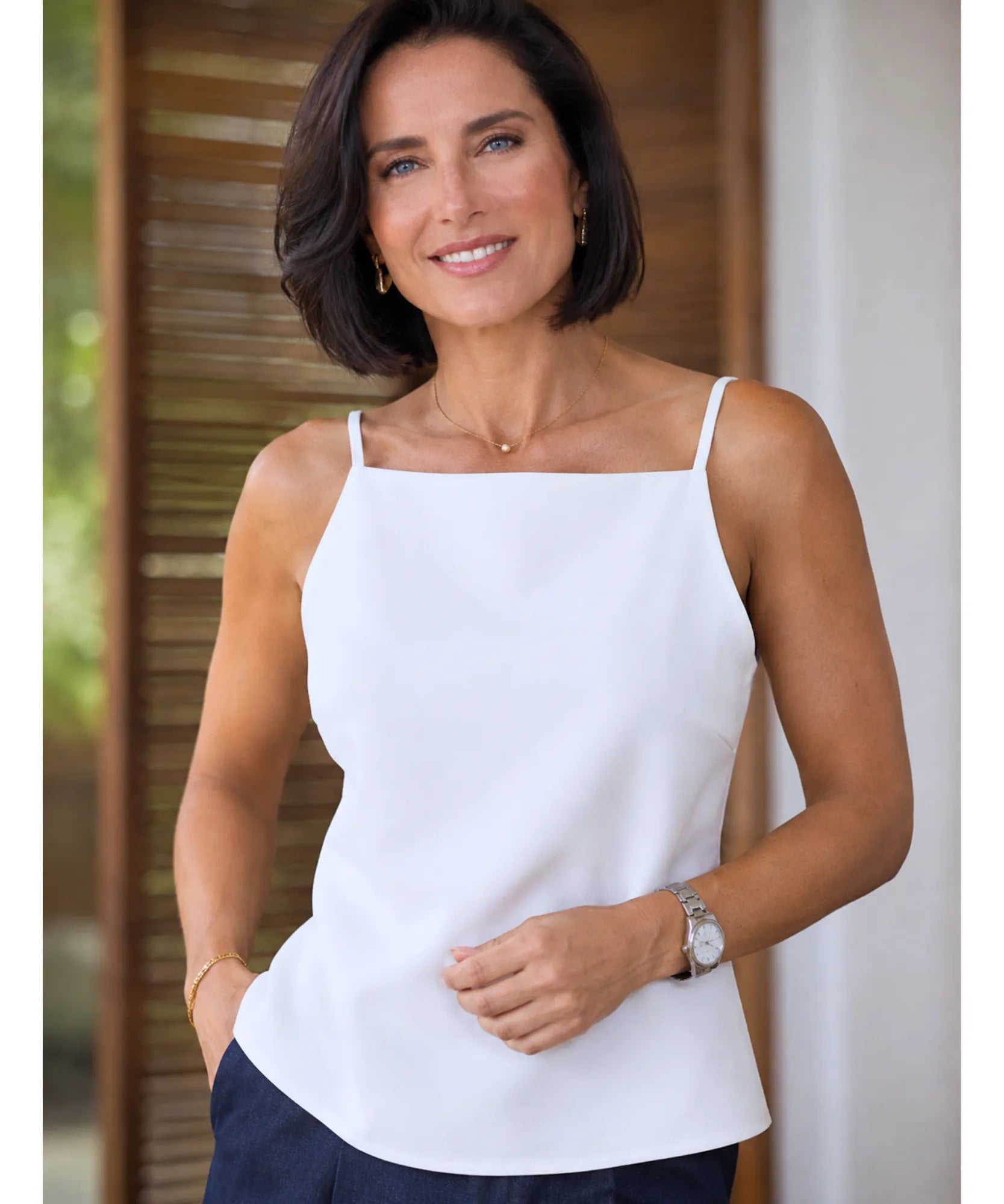 Close-up of white square neck top with thin straps
