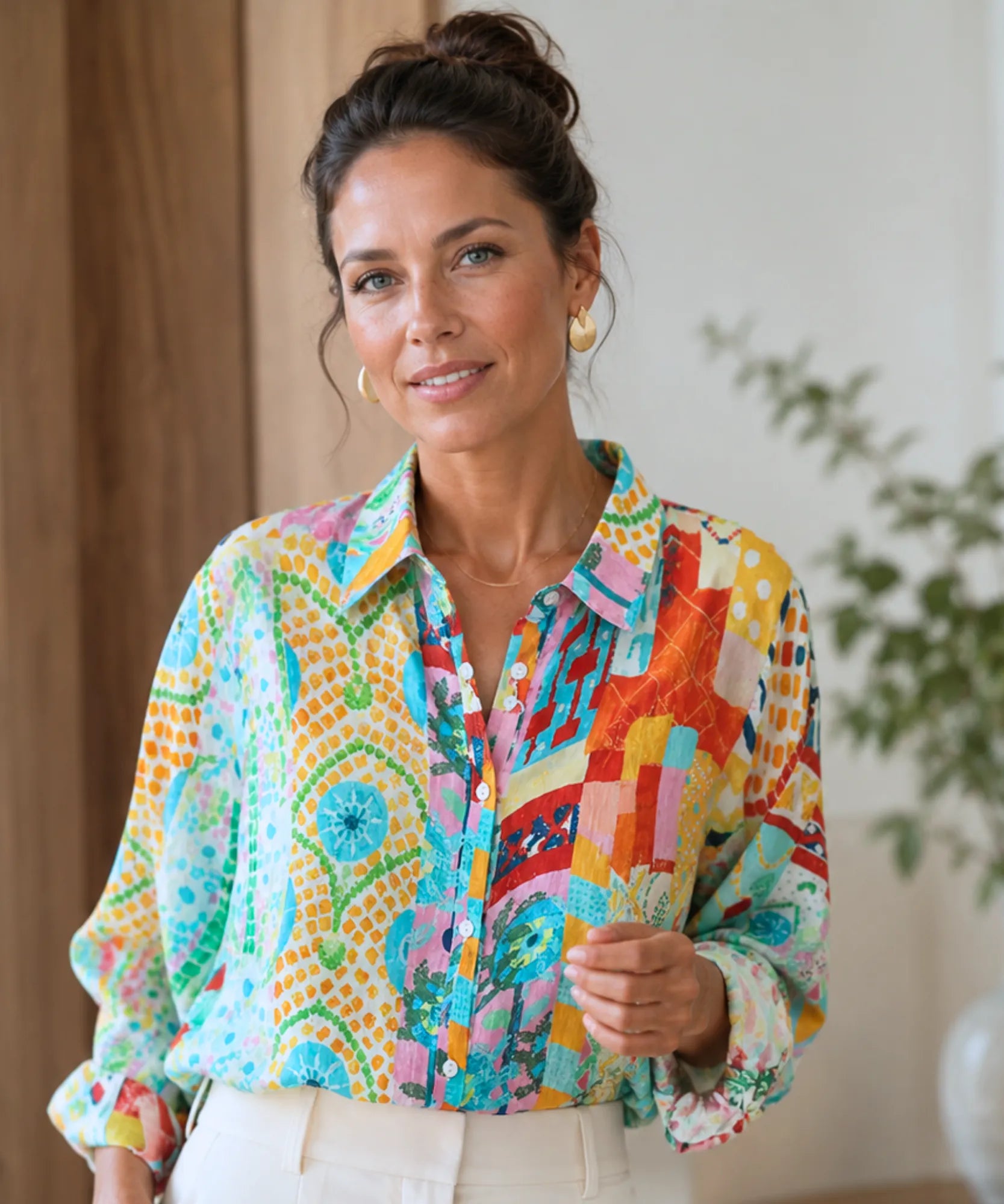 Women's linen shirt with aqua patchwork print styled with ivory trousers