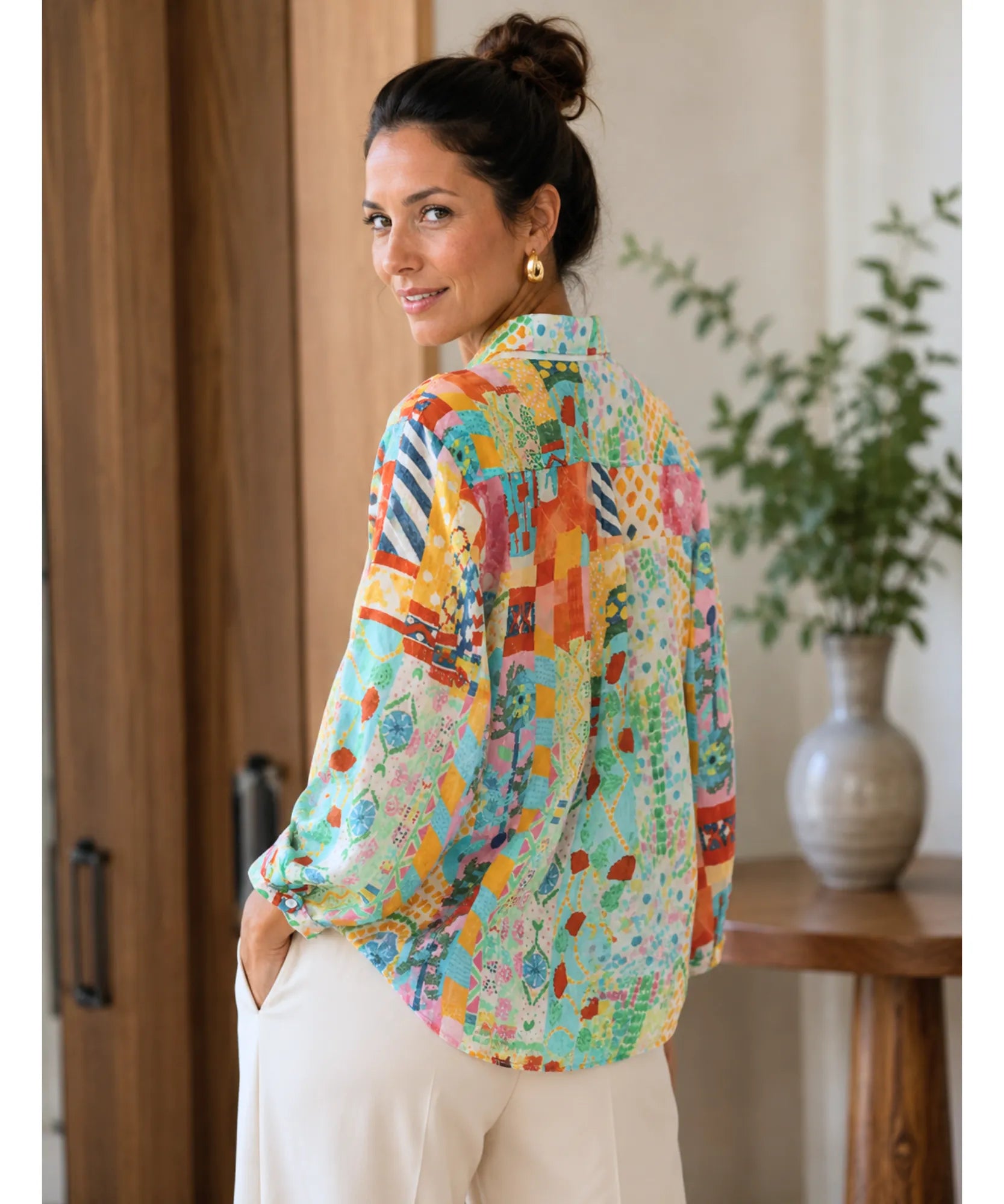 Back view of oversized linen shirt with aqua patchwork print