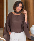 Dark brown sheer cape top with scarf collar and studded hem, front view