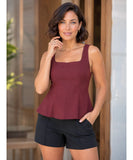Burgundy square neck peplum tank top styled with black shorts
