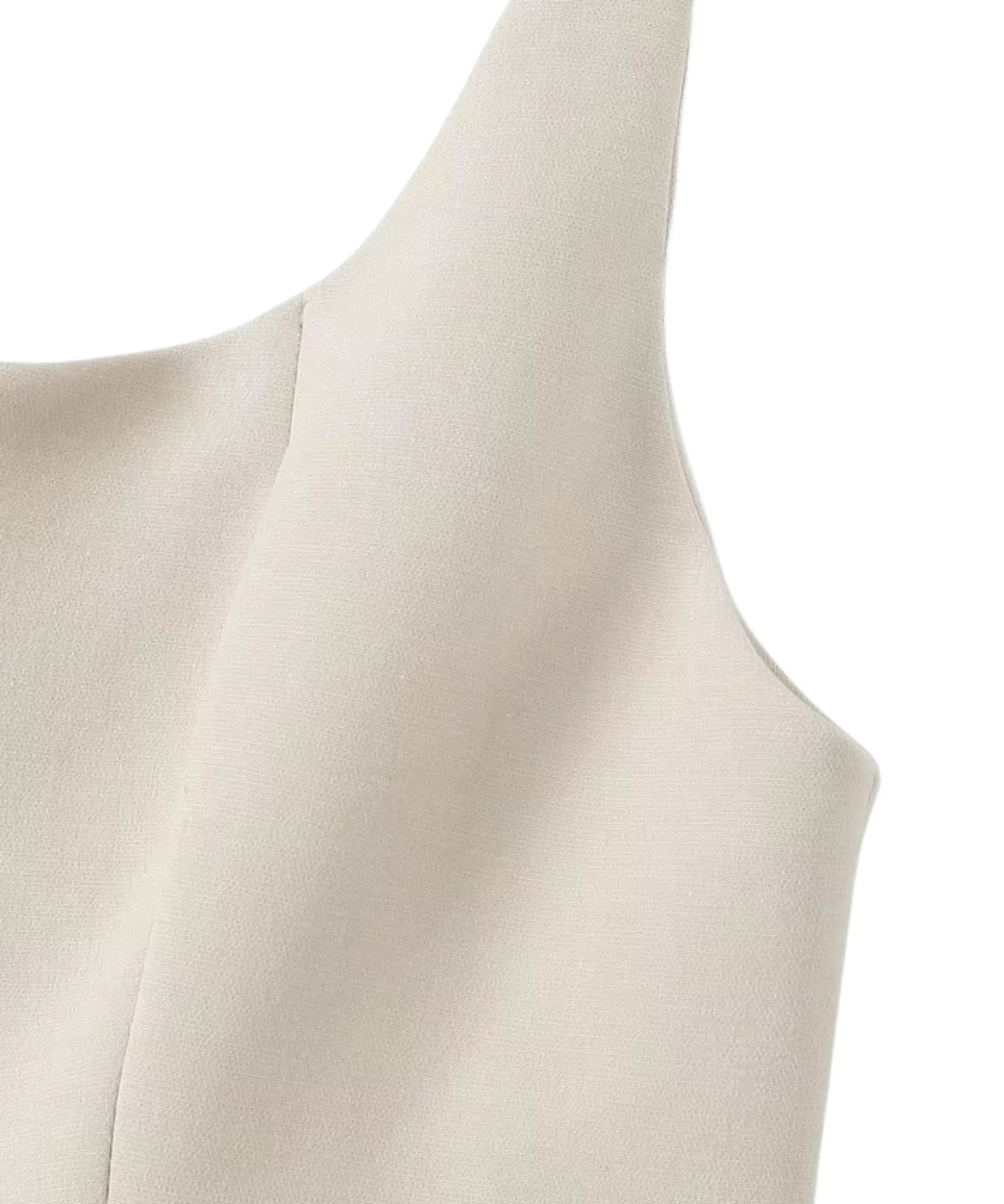 Scoop neckline and wide strap detail on an ivory peplum top