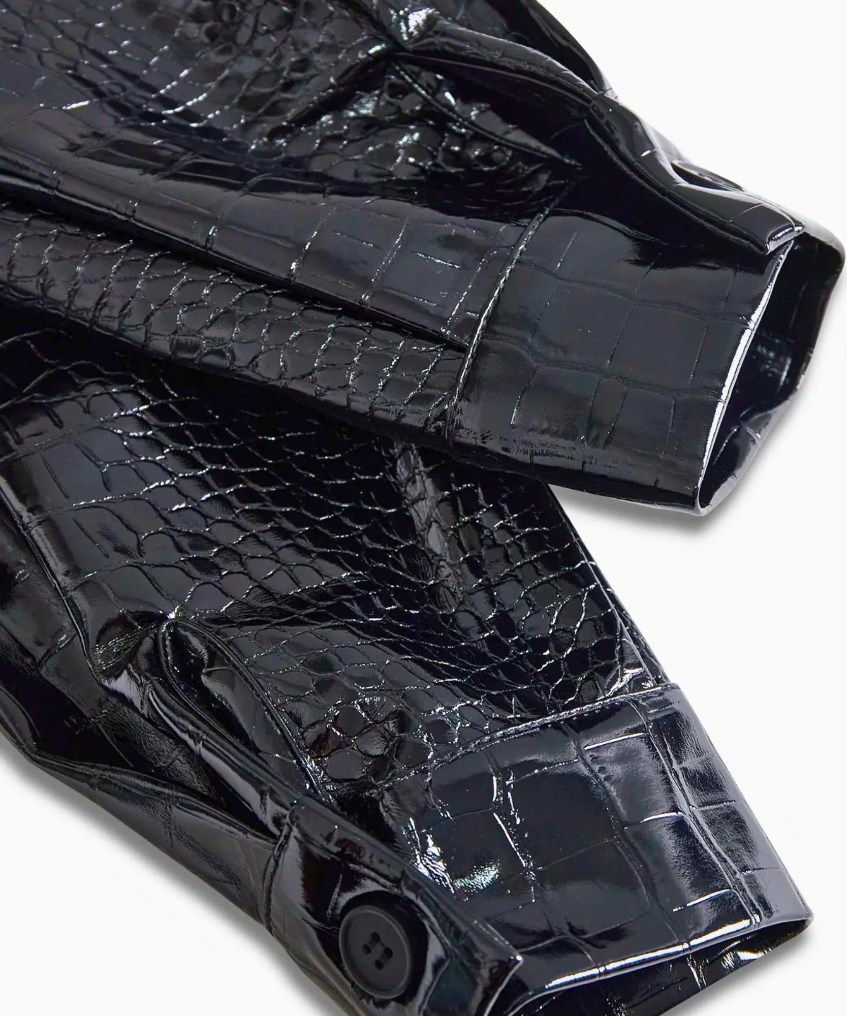 Women's black croc-embossed leather blouse, close-up detail