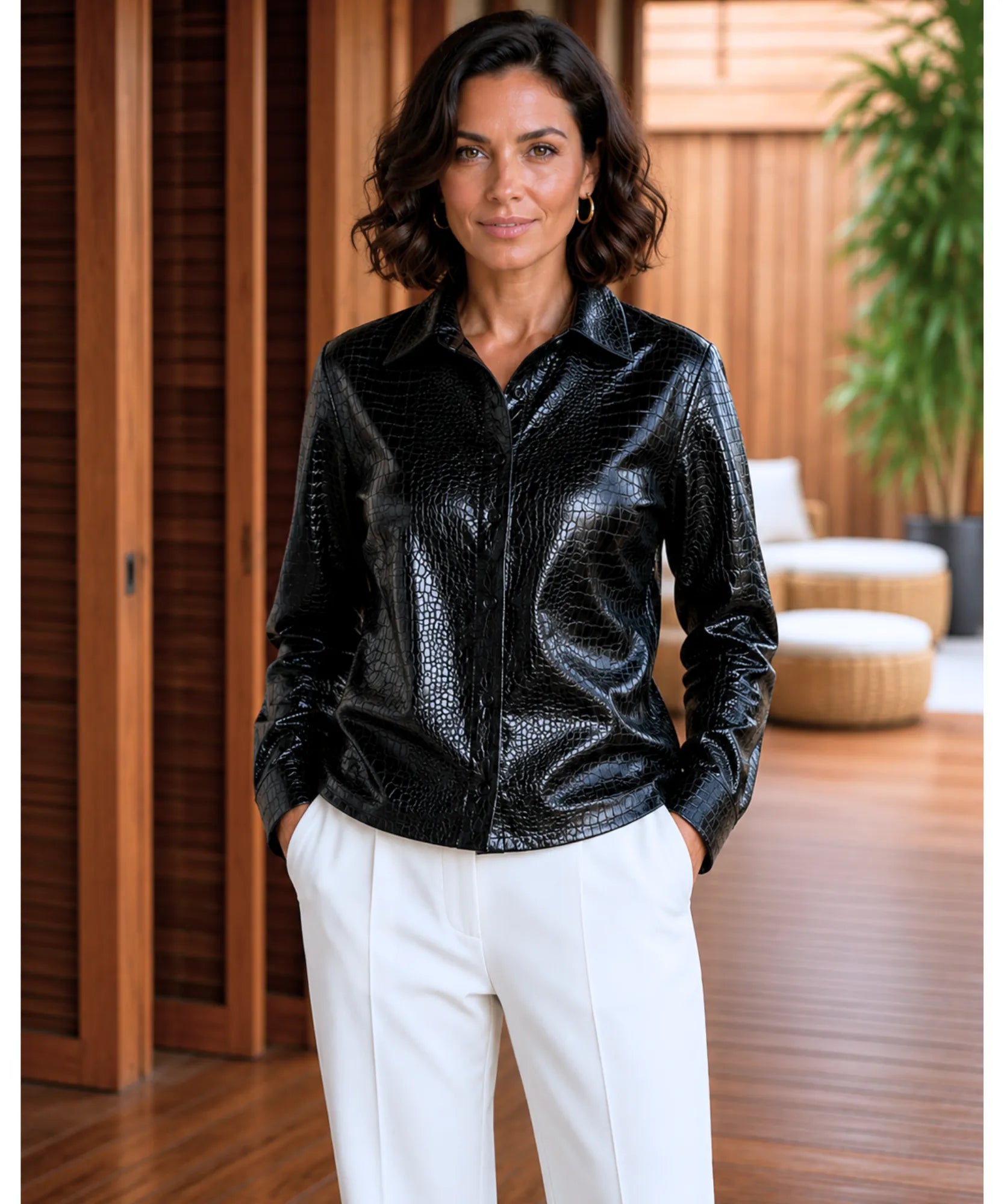 Women's black croc-embossed leather blouse, back view