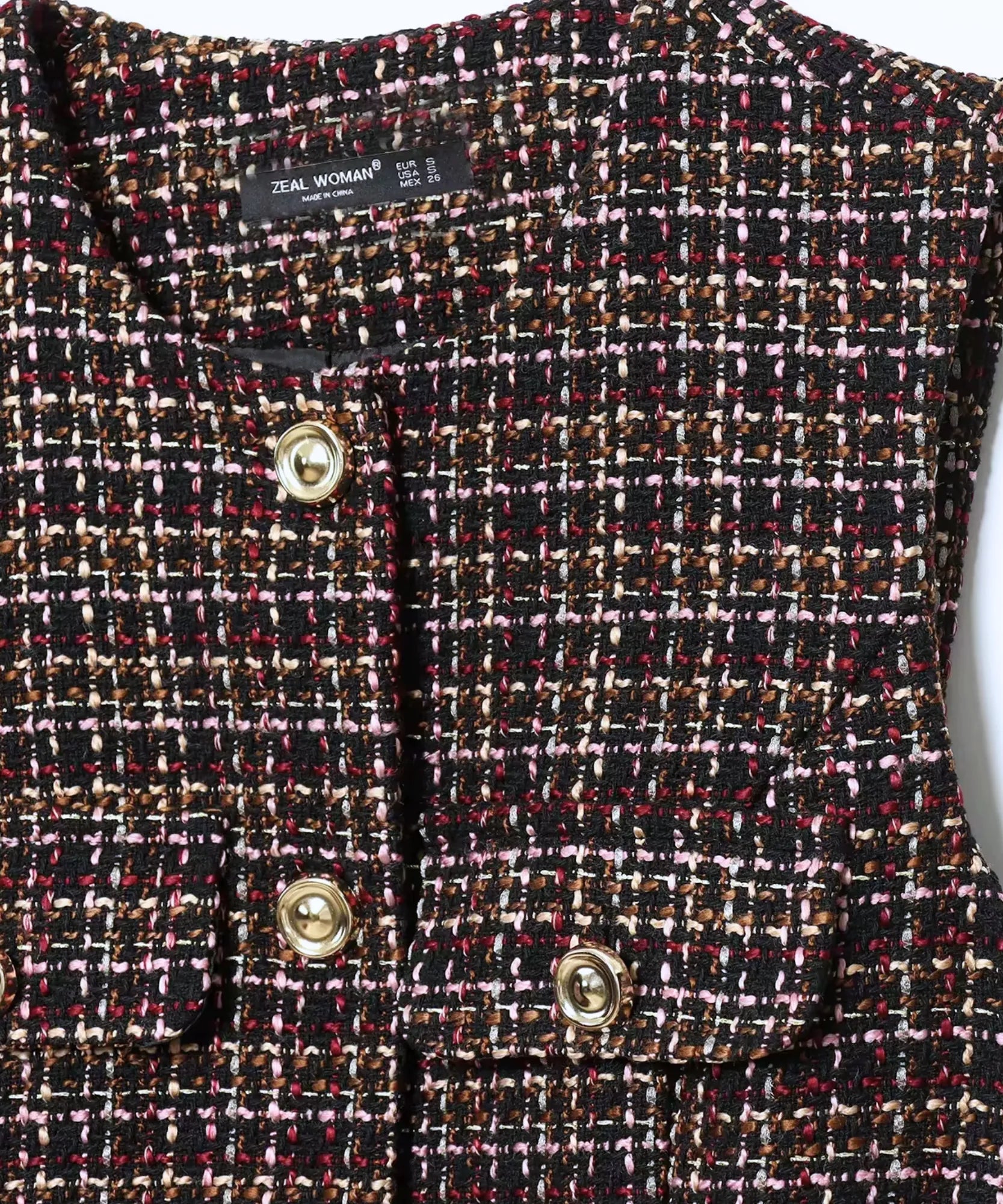 Women's tweed peplum top, detail of the flap pocket and gold button