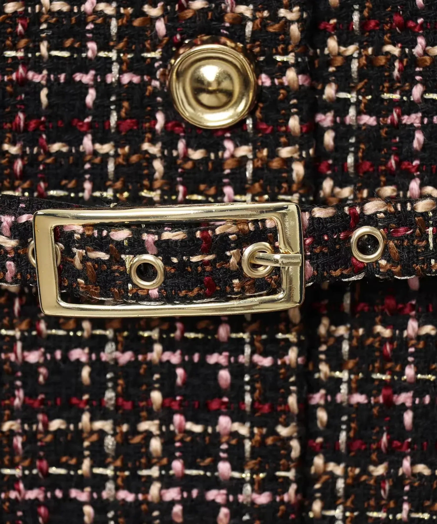 Women's tweed peplum top, detail of the gold buckle belt