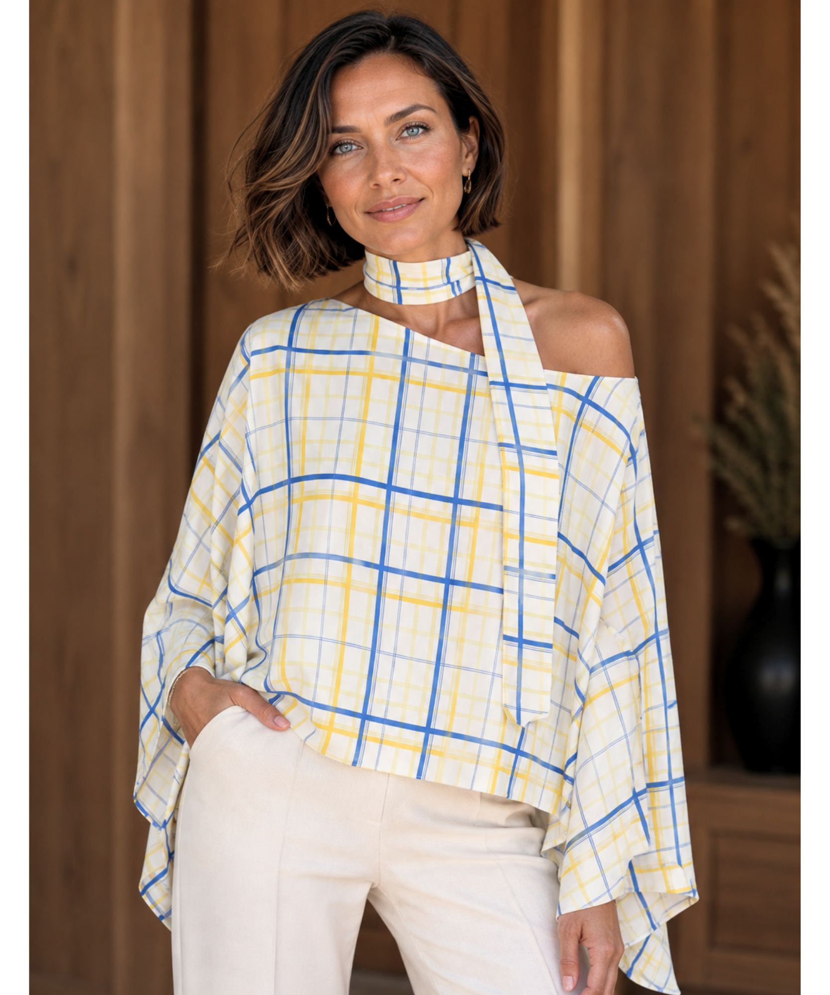 Yellow and blue plaid batwing top with scarf collar styled with ivory trousers