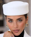 White wool pillbox hat shown from a front angle