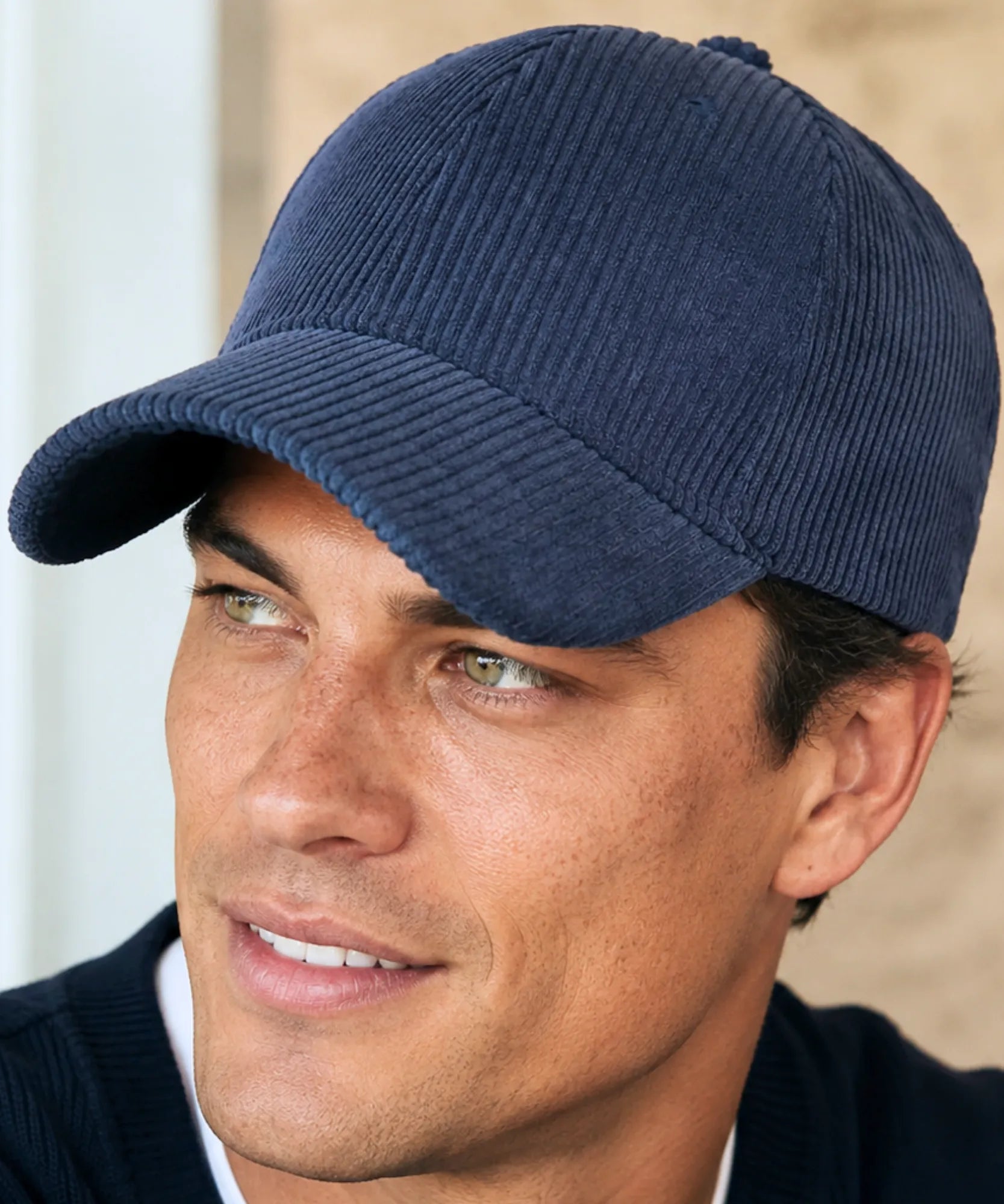 Women's corduroy baseball cap in navy, profile angle