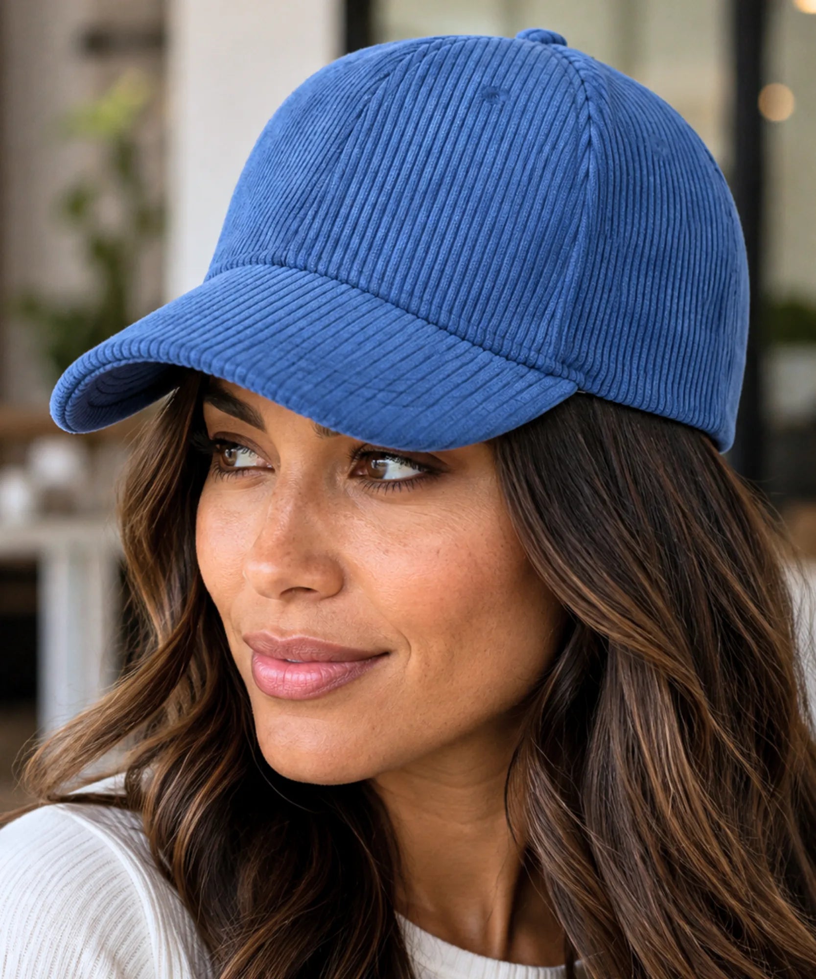 Women's corduroy baseball cap in cobalt blue, profile angle