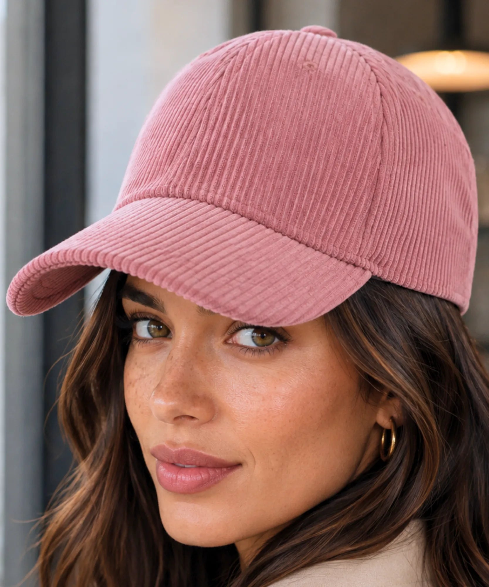 Women's corduroy baseball cap in dusty rose, profile angle