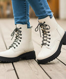 Comprar bota feminina tratorada de couro legítimo com solado robusto e cano curto para estilo urbano com conforto ANELLIMN