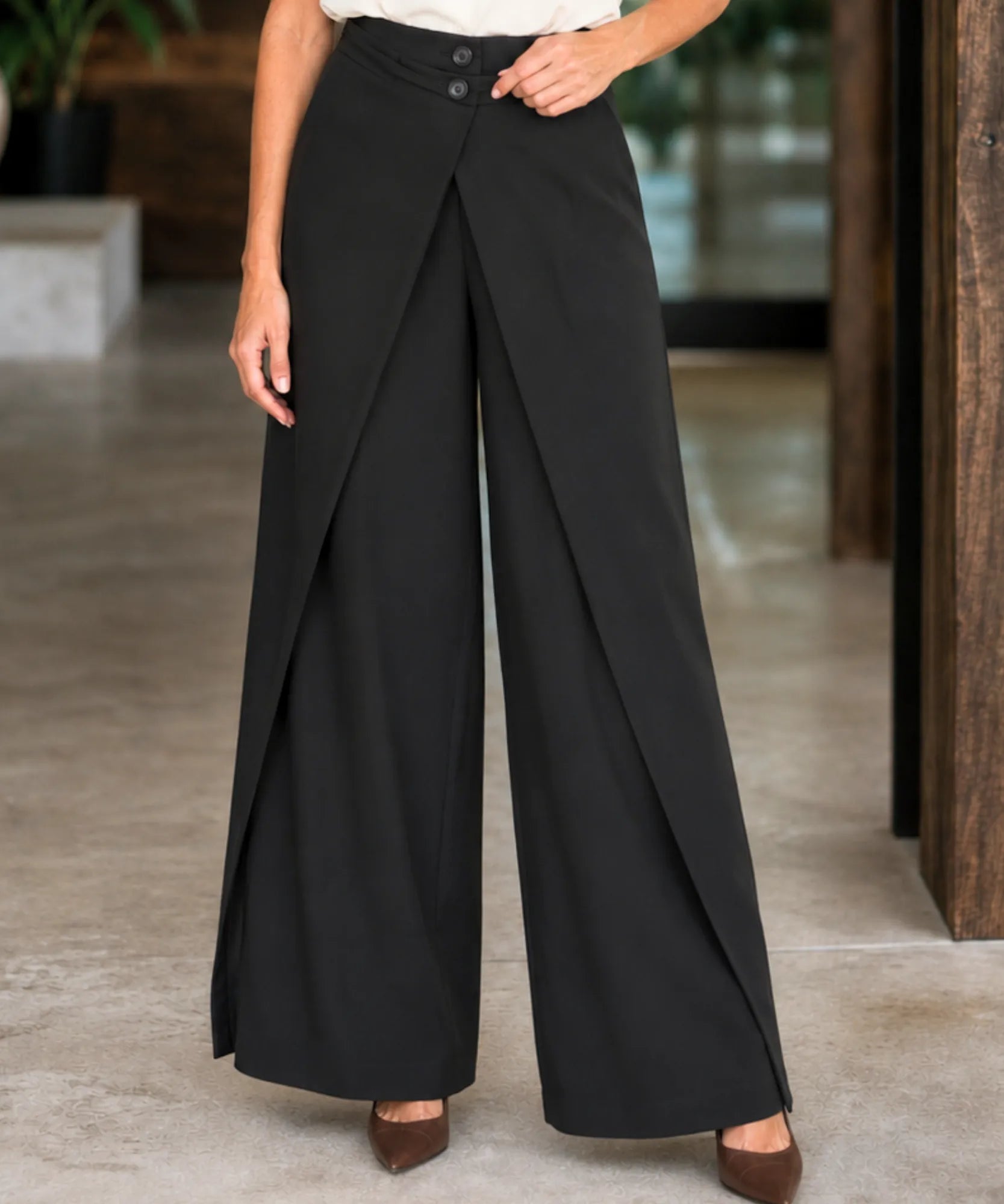 Women's black wide leg wrap pants with an overlap front