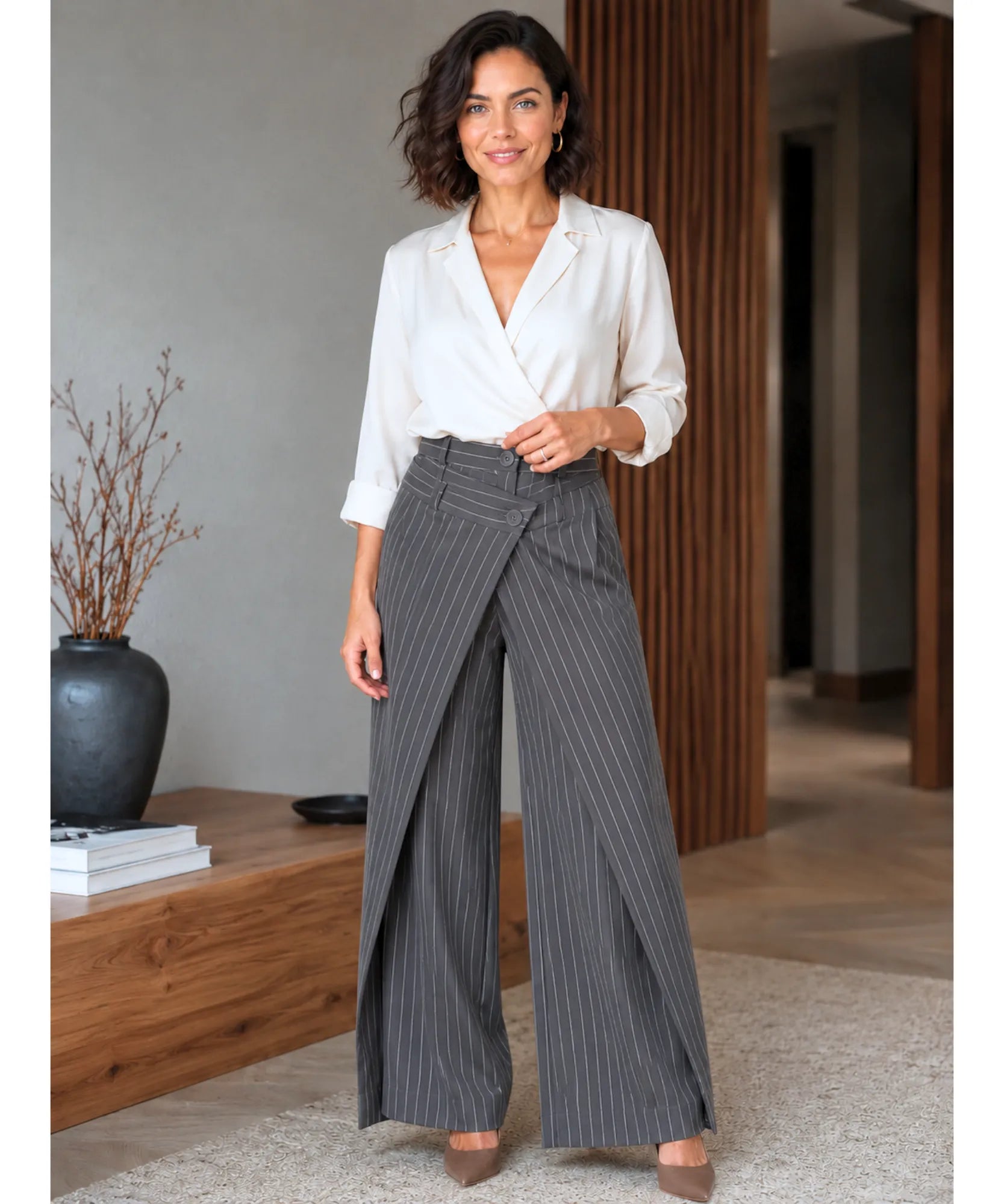 Women's charcoal pinstripe wide leg wrap pants styled with a white blouse