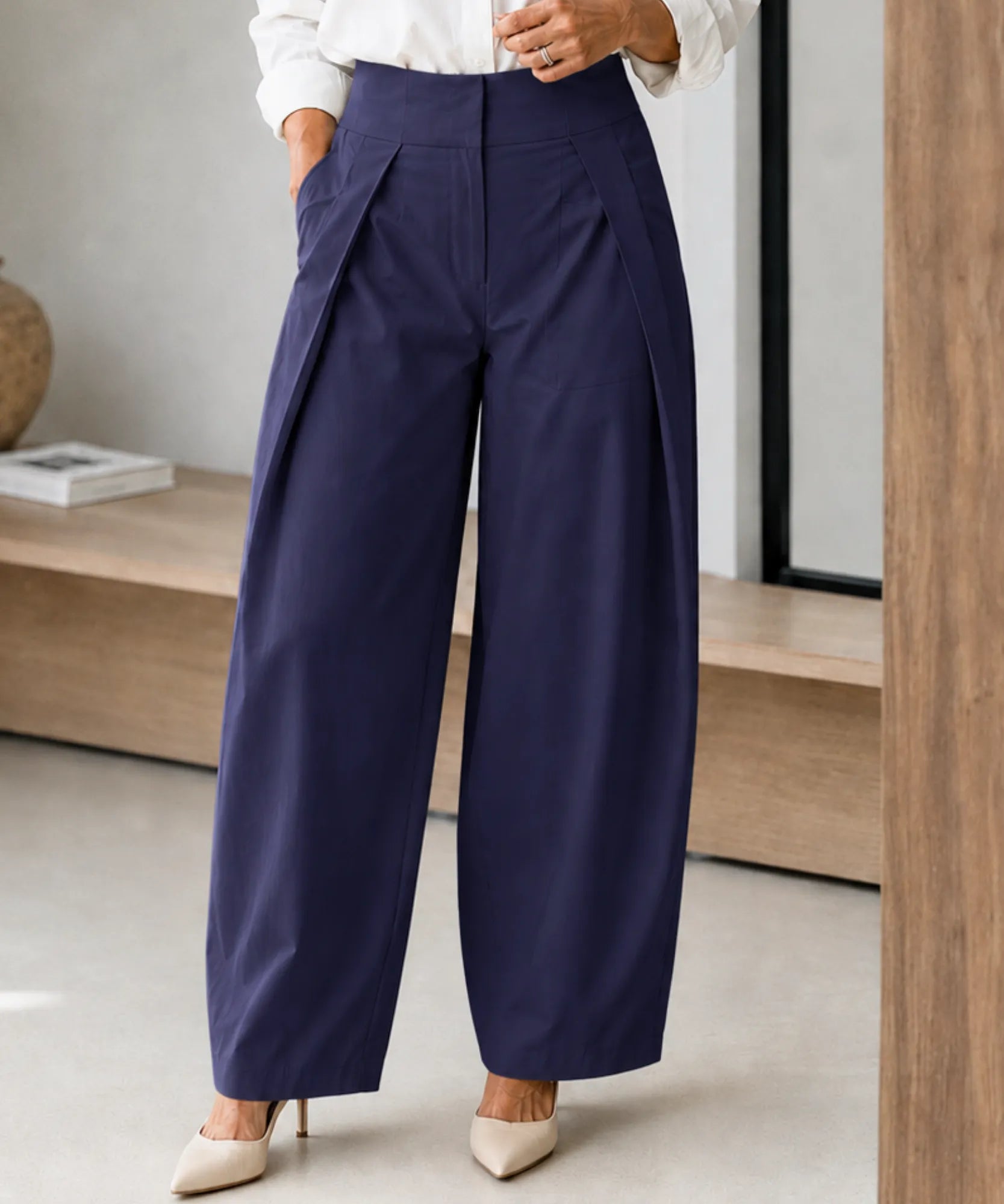Women's high waisted barrel pants in navy front view