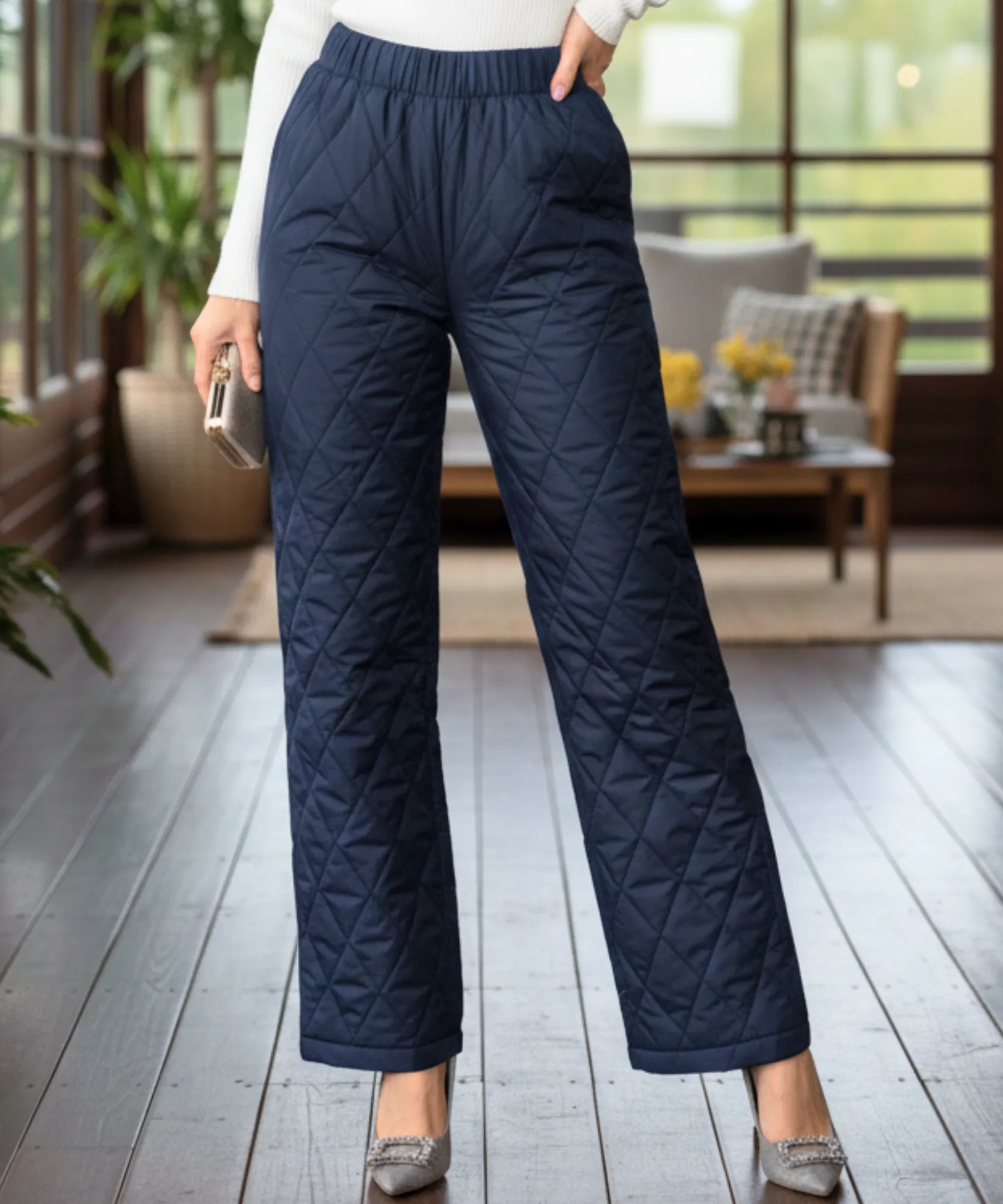 Women's quilted thermal pants in navy, front view