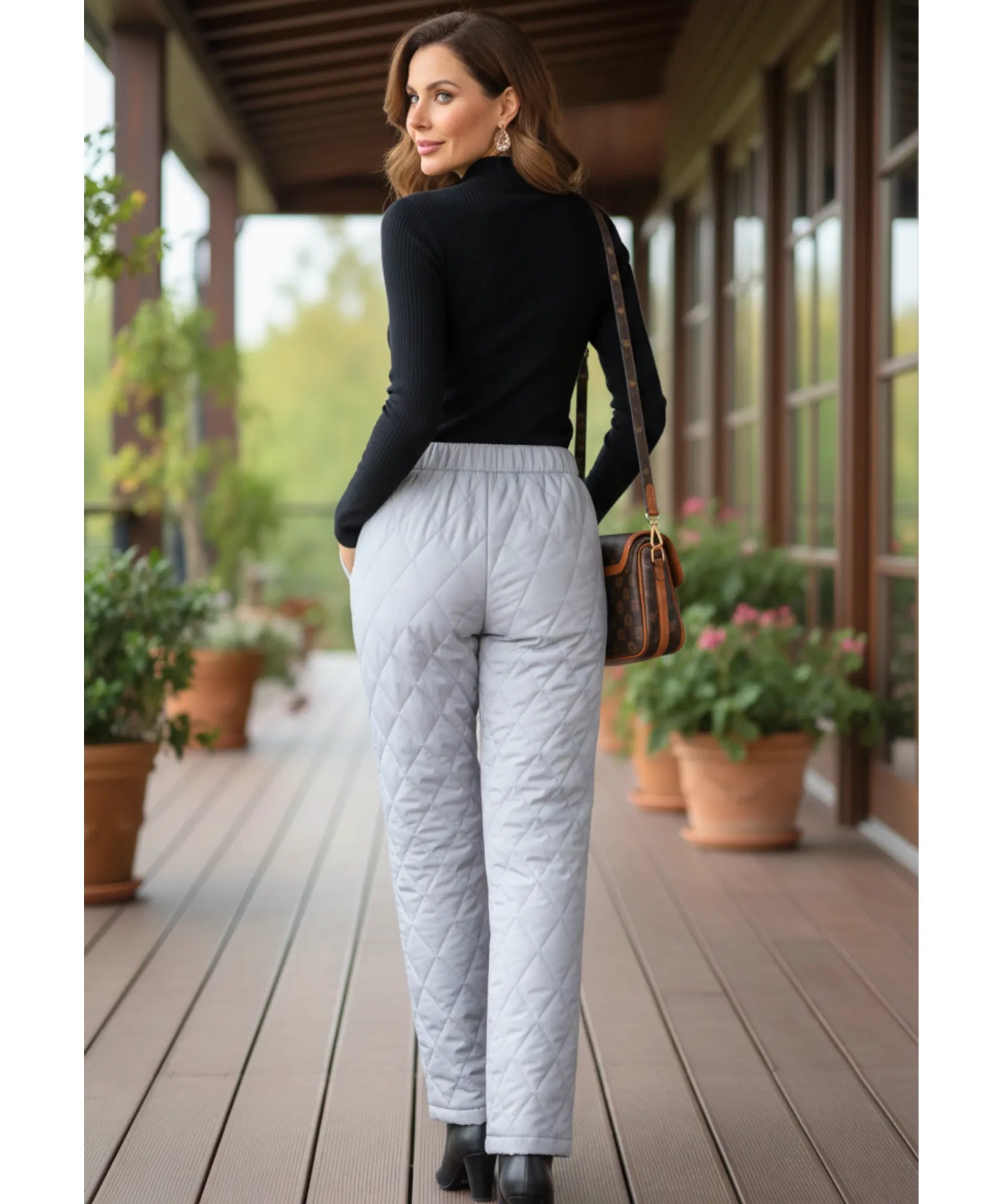 Women's quilted thermal pants in grey, front view