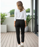 Woman wearing black sherpa-lined joggers