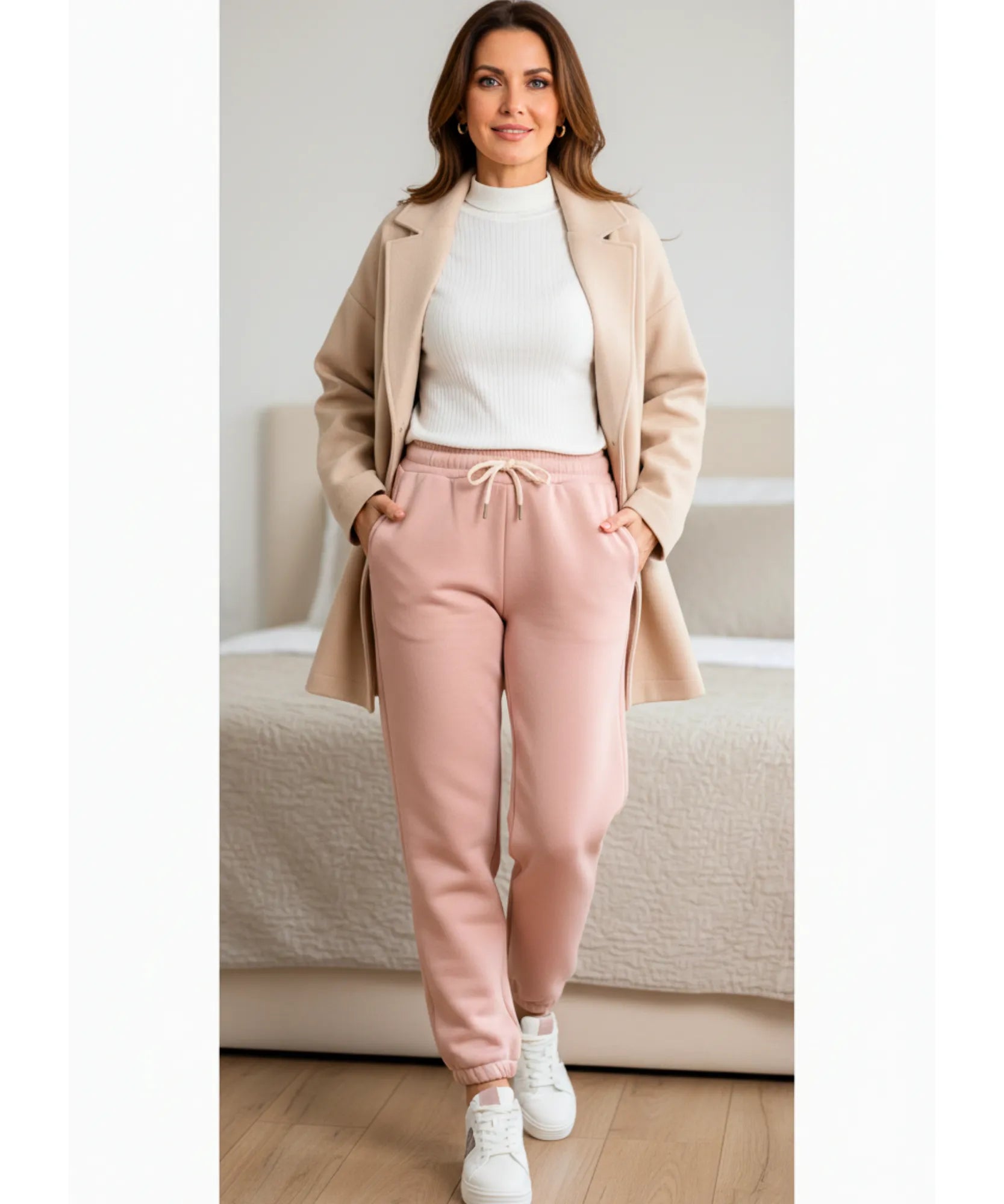 Woman wearing hot pink sherpa-lined joggers, front view