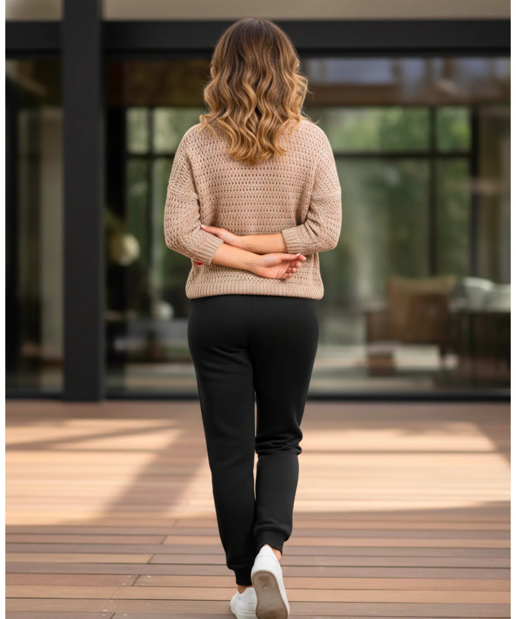 Women's fleece-lined sweatpants in black, close-up of fleece lining