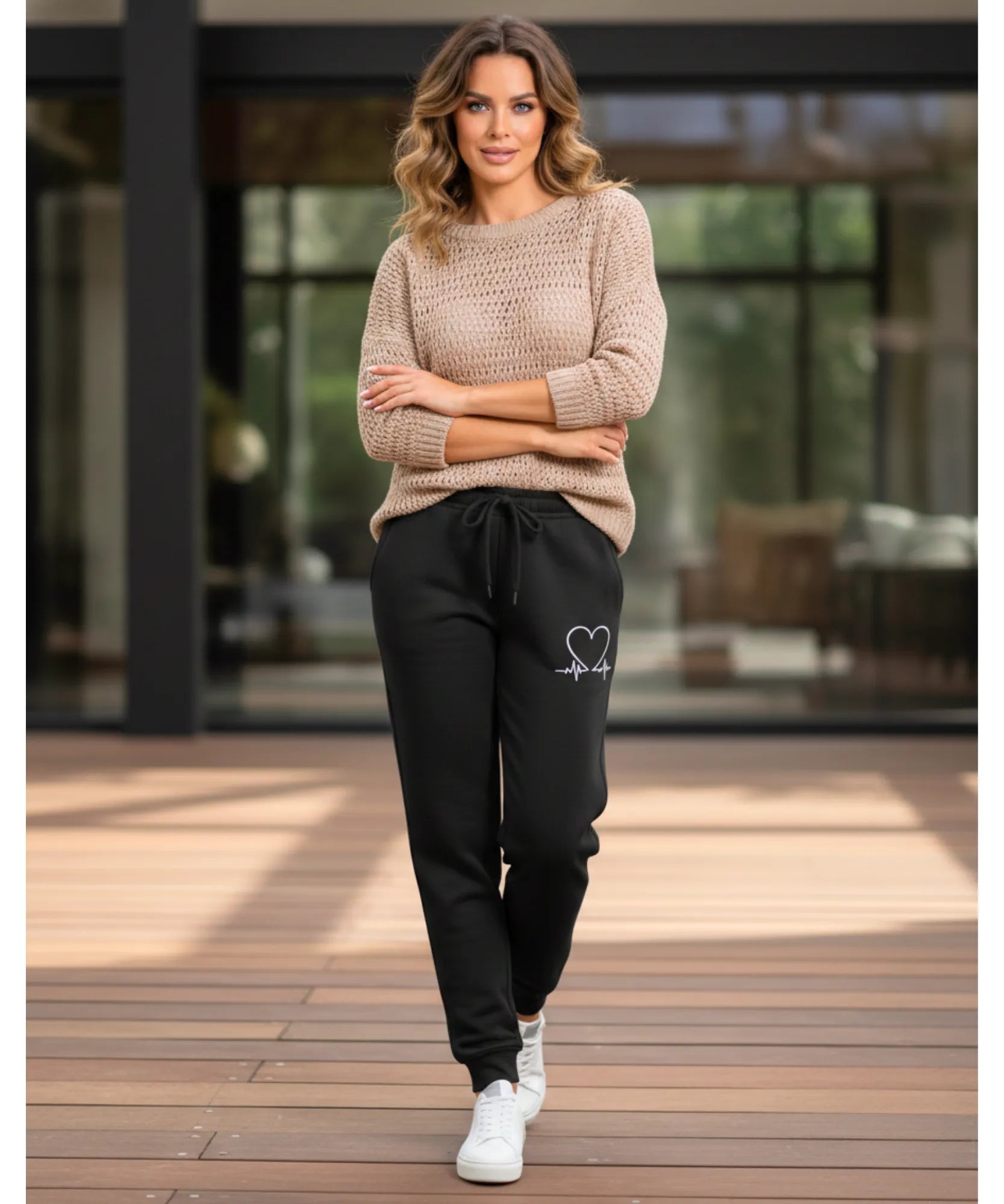 Women's fleece-lined sweatpants in black, front view