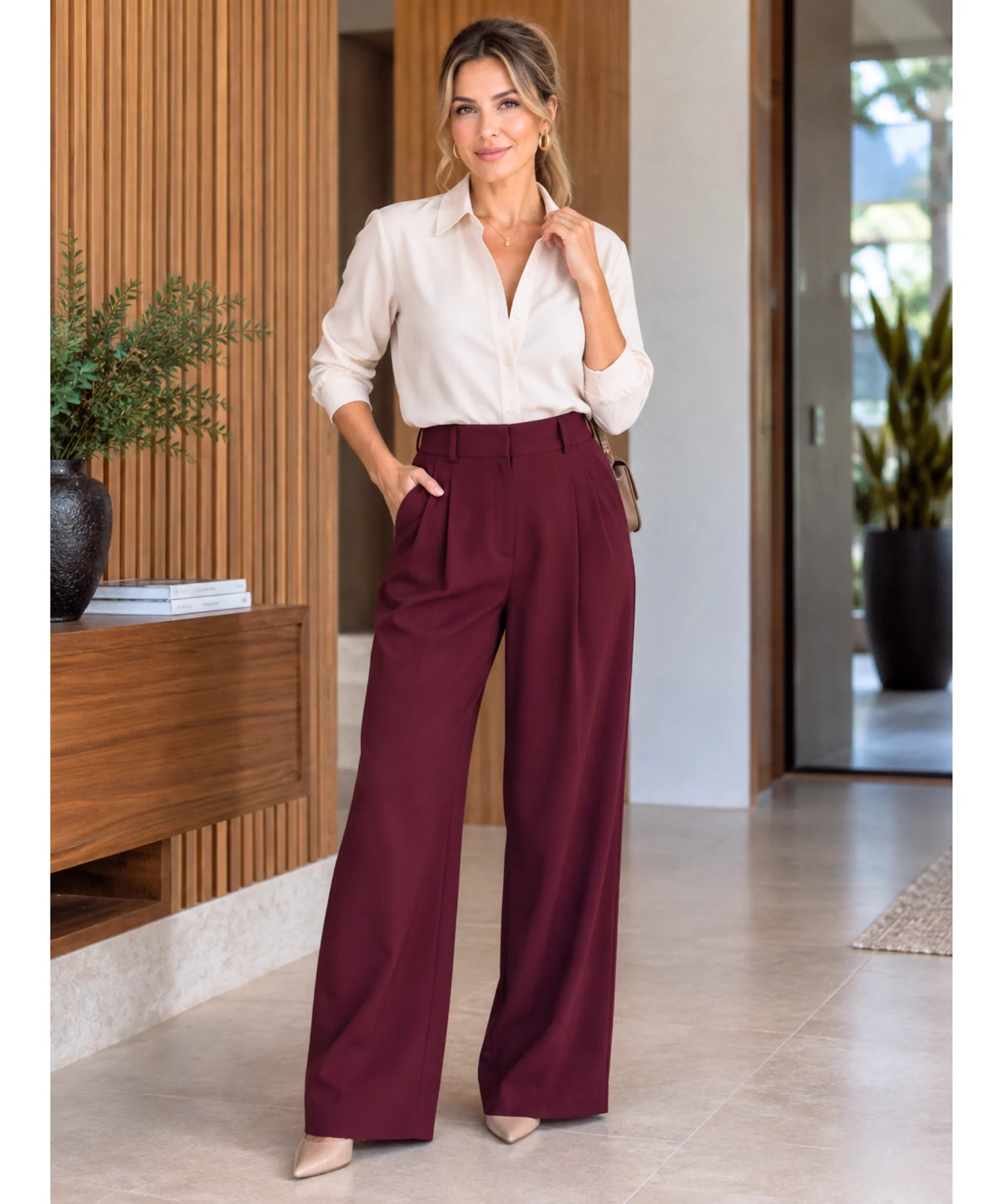 Burgundy wide-leg trousers styled with an ivory shirt