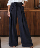 Women's navy pinstripe wide leg pants with a tie waist