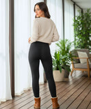 Woman wearing black fleece-lined leggings with a brushed flannel exterior