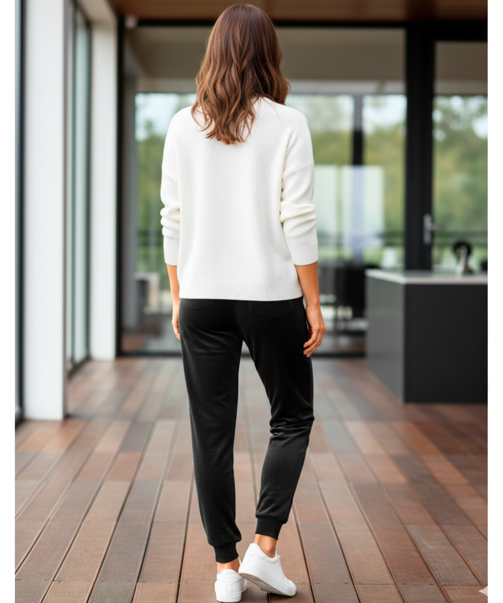 Woman wearing black velvet joggers with a sherpa lining