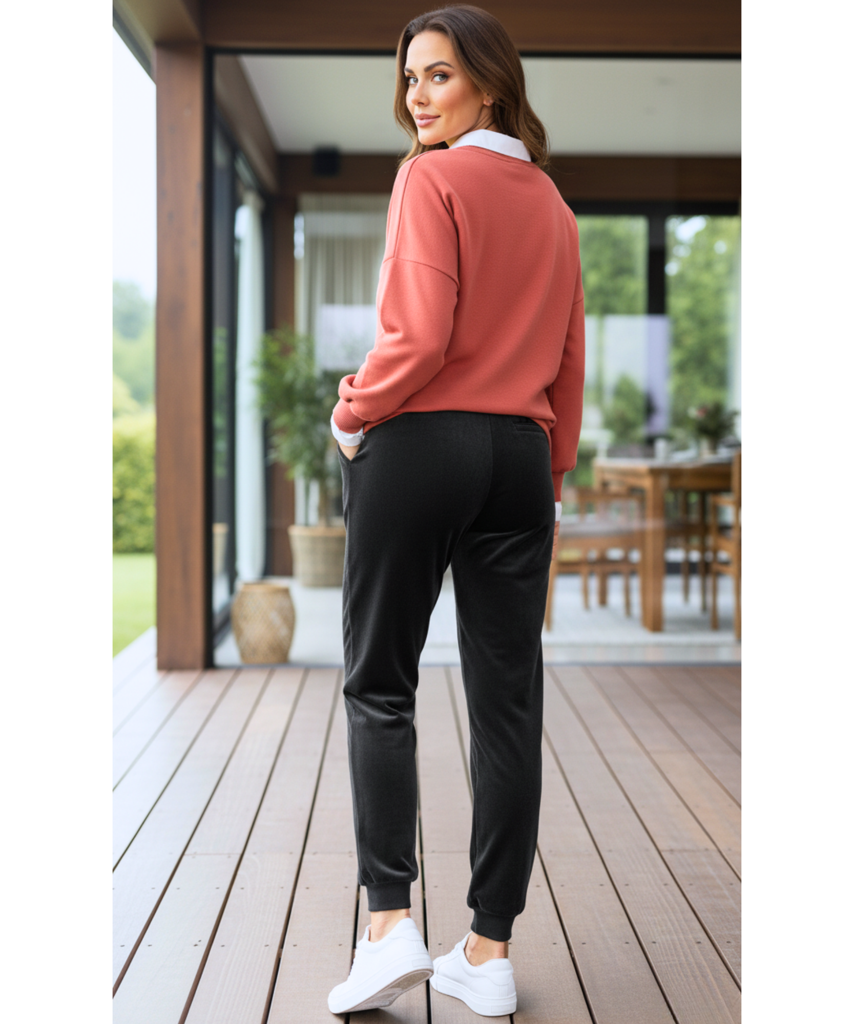 Woman wearing black velvet joggers with a sherpa lining