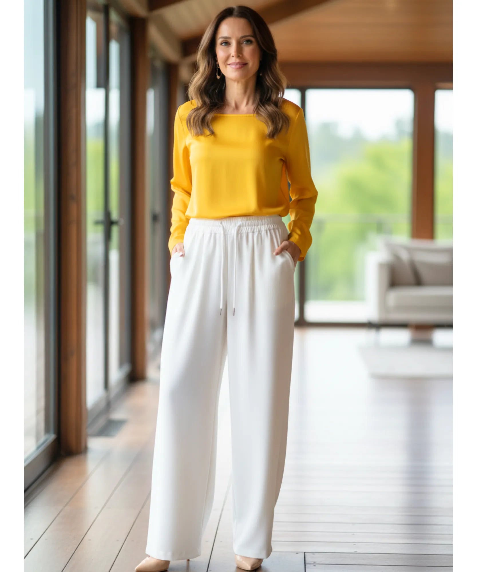 Woman wearing white fleece-lined wide-leg sweatpants, front view