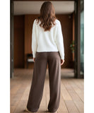 Woman wearing dark brown fleece-lined wide-leg sweatpants