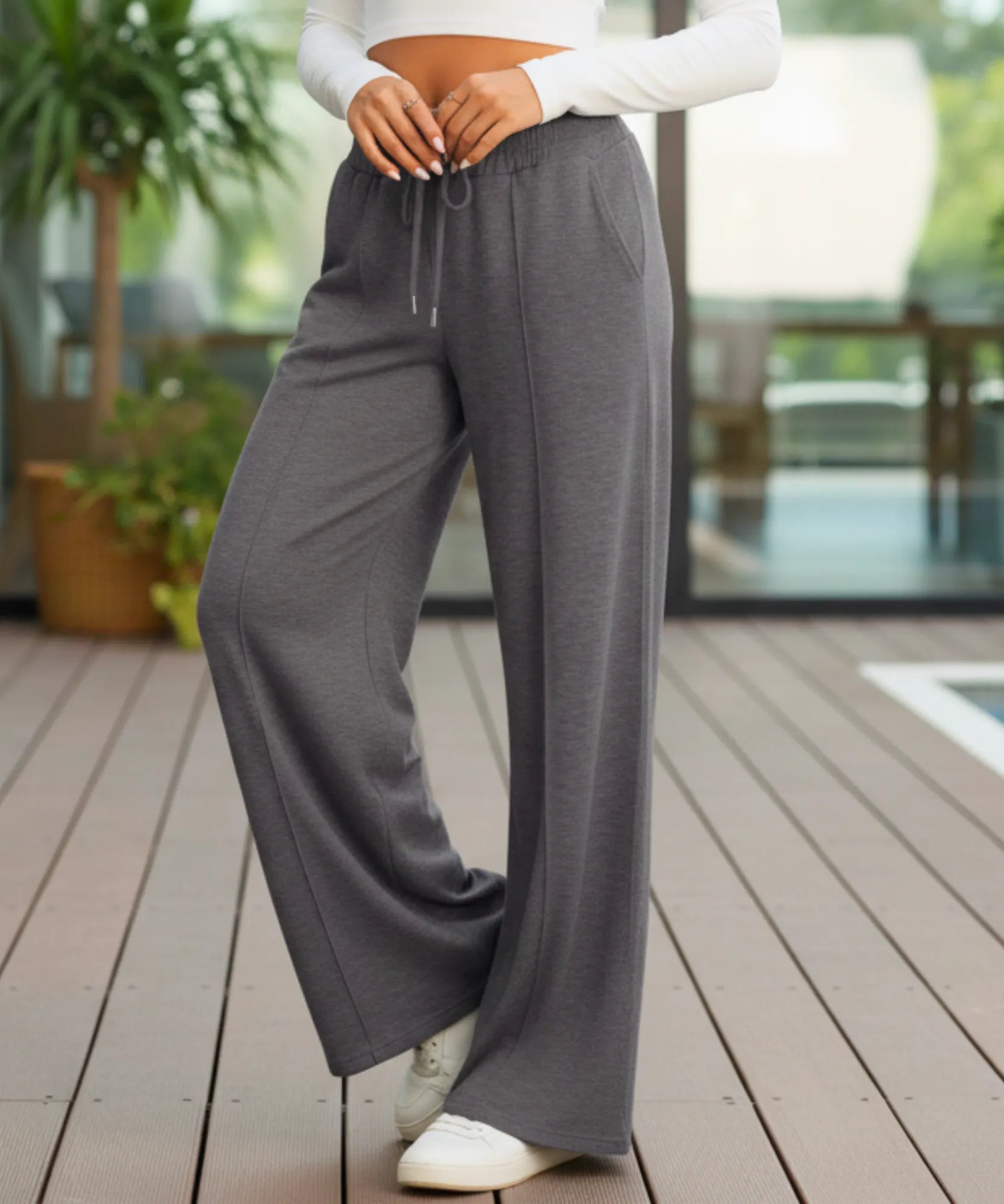 Women's wide leg sweatpants, a grey tone, close-up