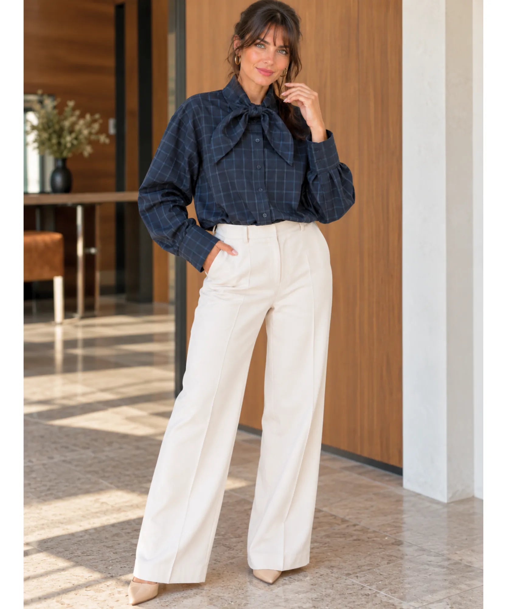 Women's tie neck blouse in navy plaid