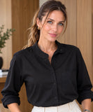 Women's relaxed black button up shirt with a mandarin collar and chest pocket, front view