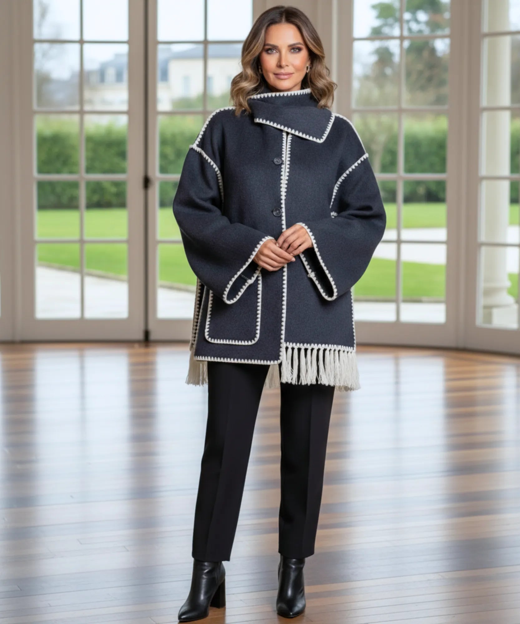 Front view of the wool cape coat in grey