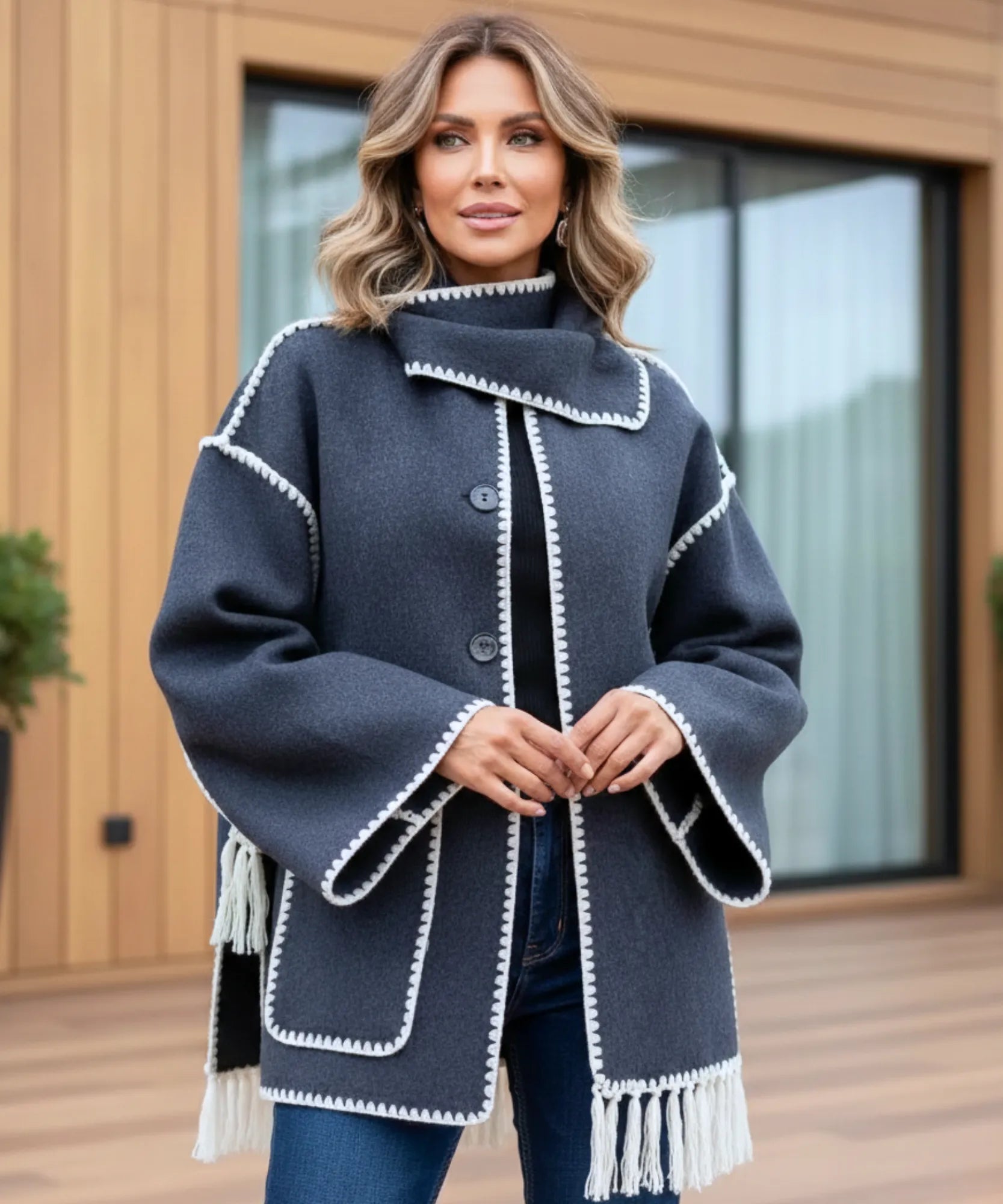 Front view of the wool cape coat in charcoal