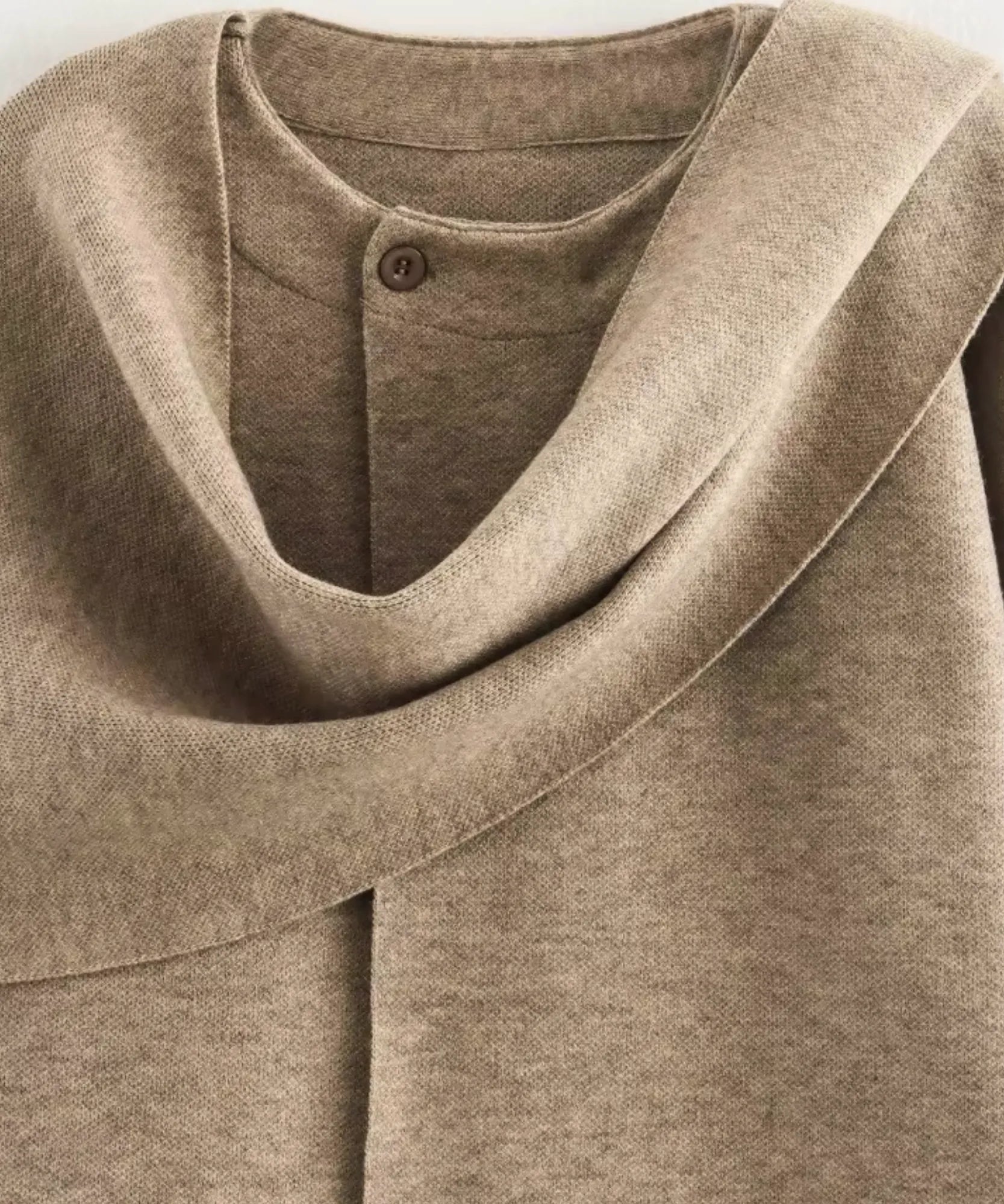 Front view of the oversized wool wrap coat in taupe
