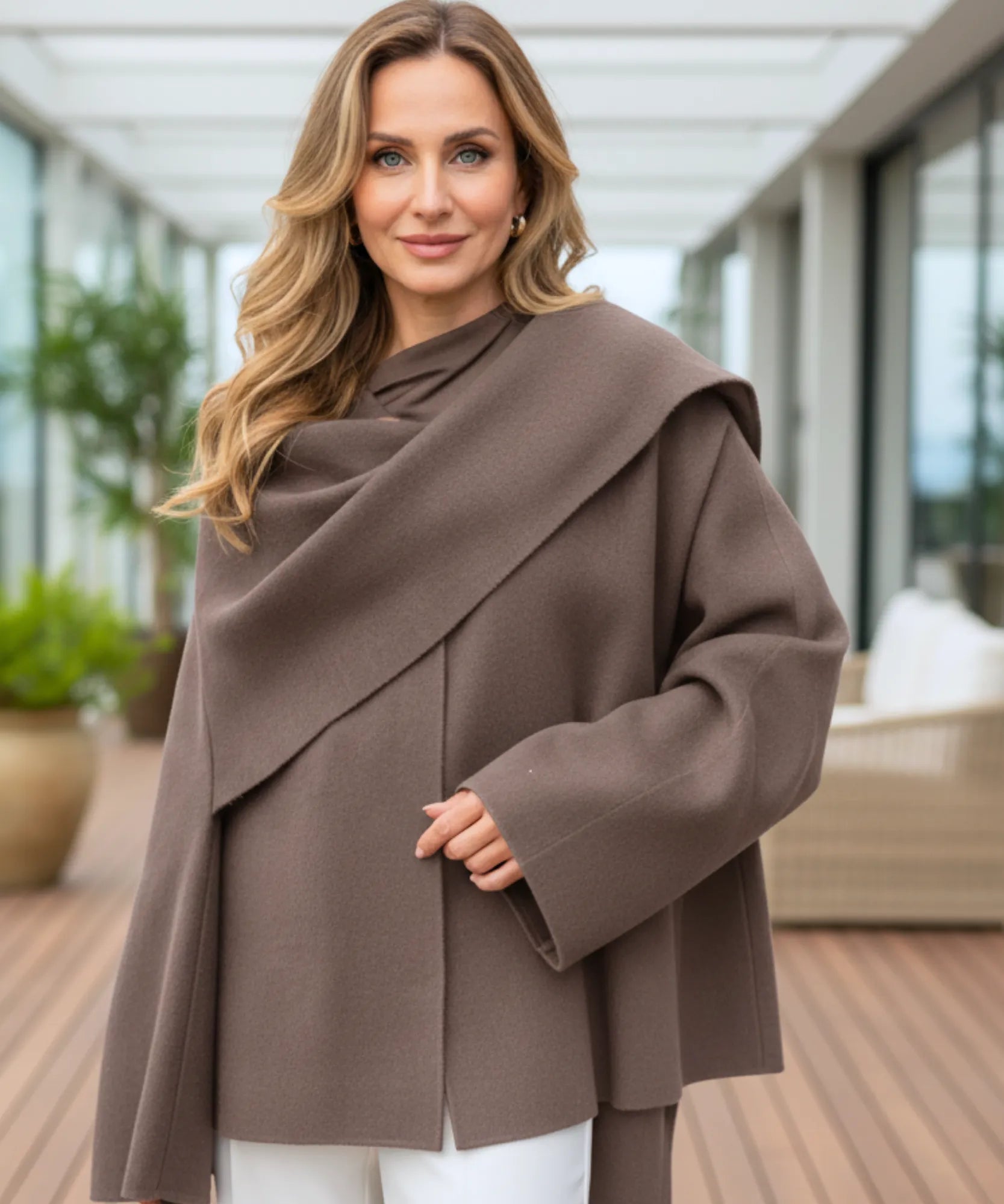 Close-up of the taupe wool coat's shawl collar