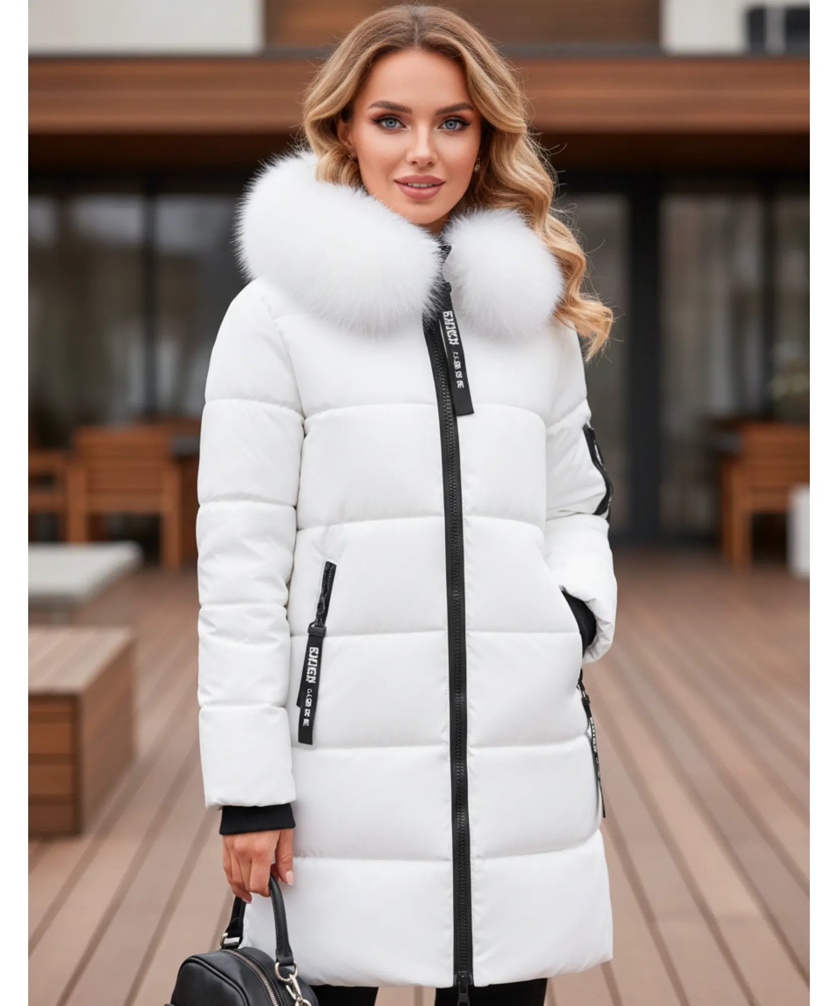 Woman wearing a long hooded parka coat in white