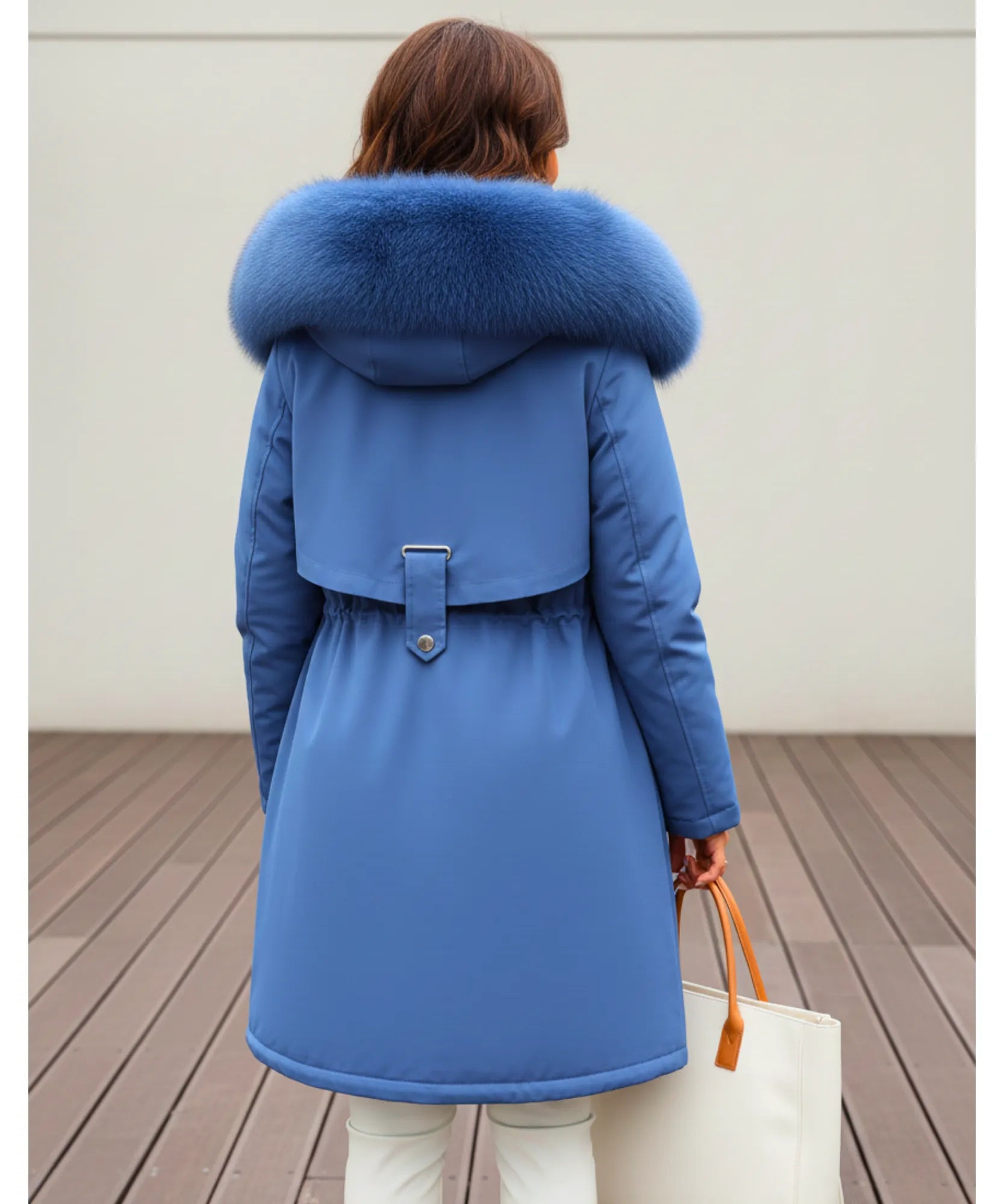 Close-up of the slate blue parka coat fur trim