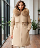 Woman wearing a long parka coat in camel