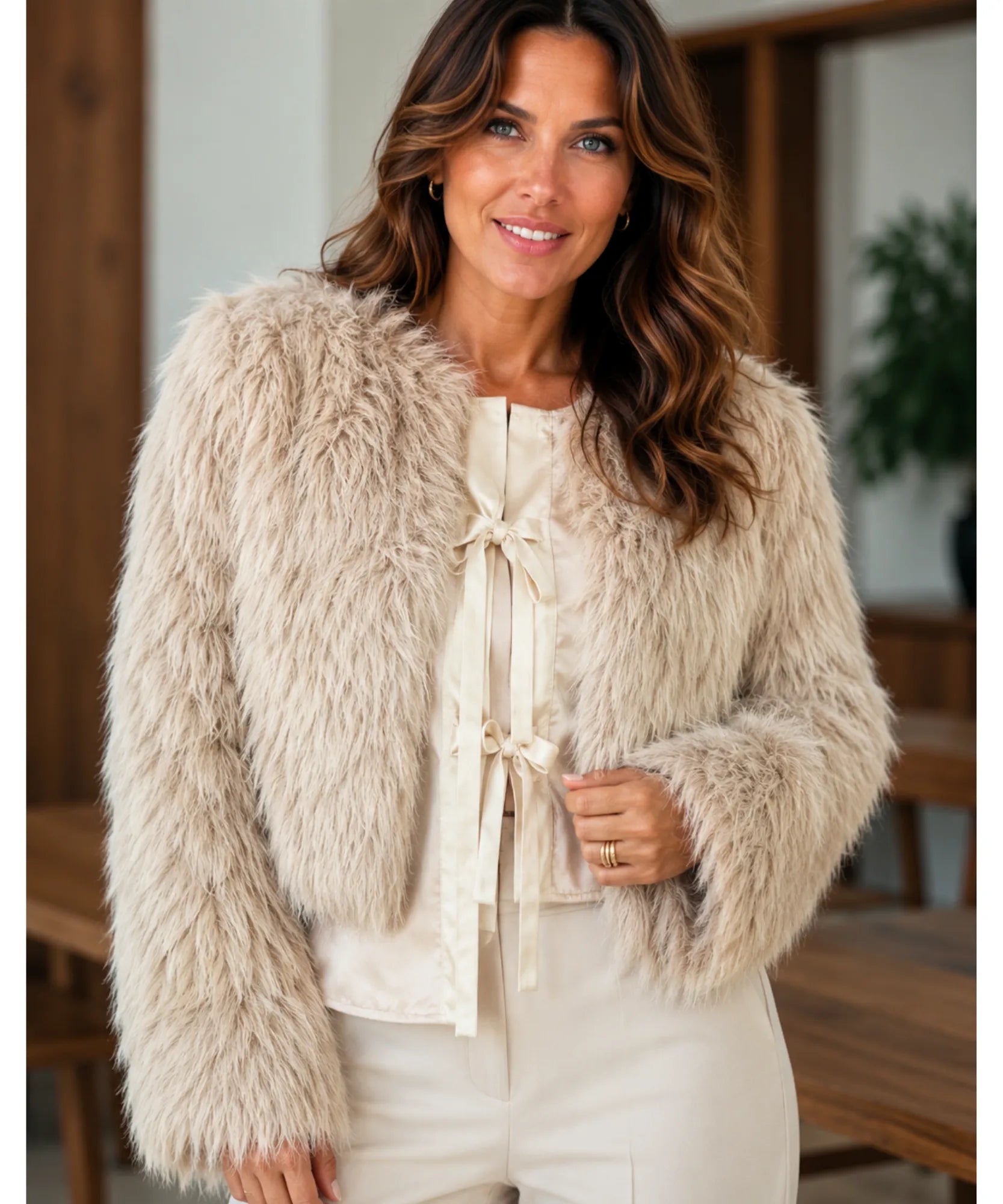 Women's short fur jacket in camel, detail view