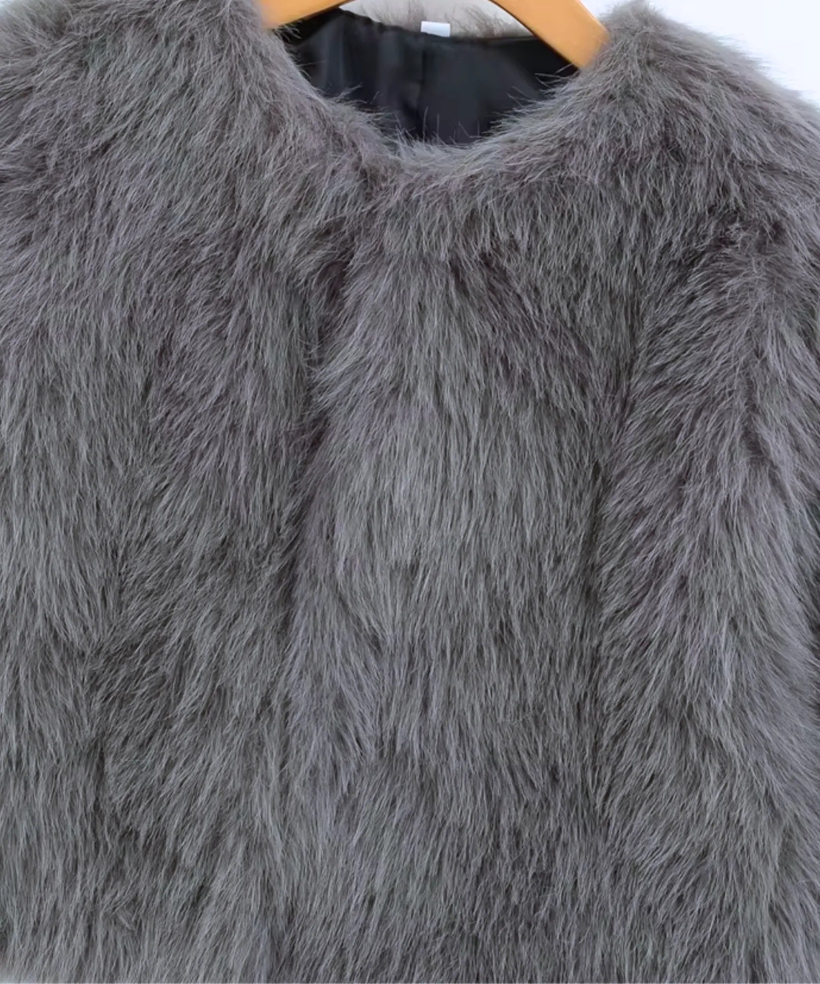 Women's short vegan fur jacket in grey
